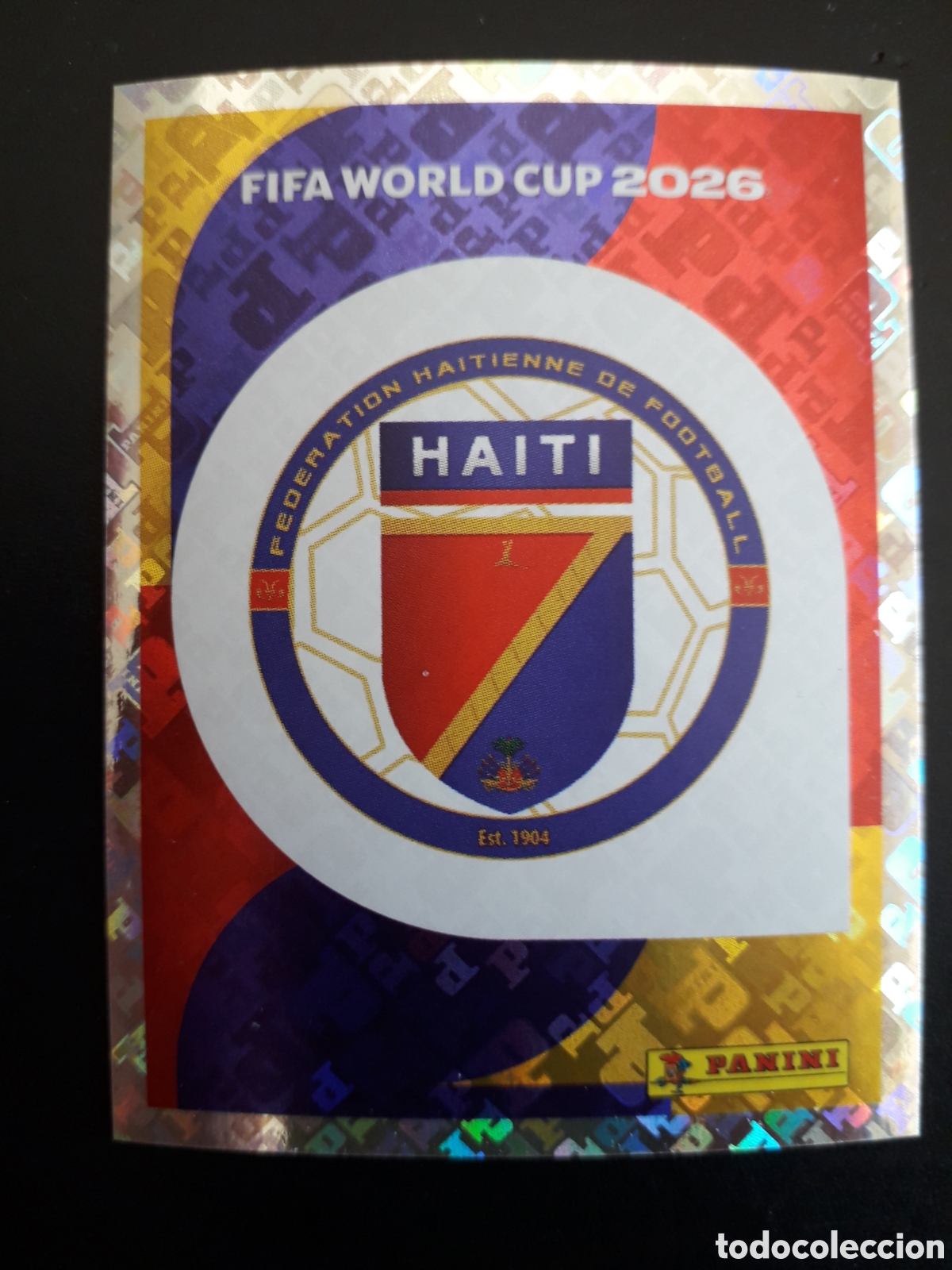 Cromos de f&uacute;tbol: ESCUDO HAIT&Iacute; HAI 1 MUNDIAL F&Uacute;TBOL 2026 FIFA WORLD CUP PANINI SIN PEGAR PEDIDO M&Iacute;NIMO 3&euro;