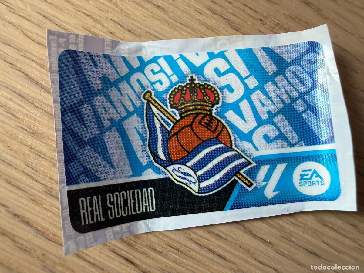 Cromos de f&uacute;tbol: VAMOS ESCUDO REAL SOCIEDAD 26 27 2026 2027 LIGA EA SPORTS CHICLES CHICLE ESTE SIN PEGAR STICKER