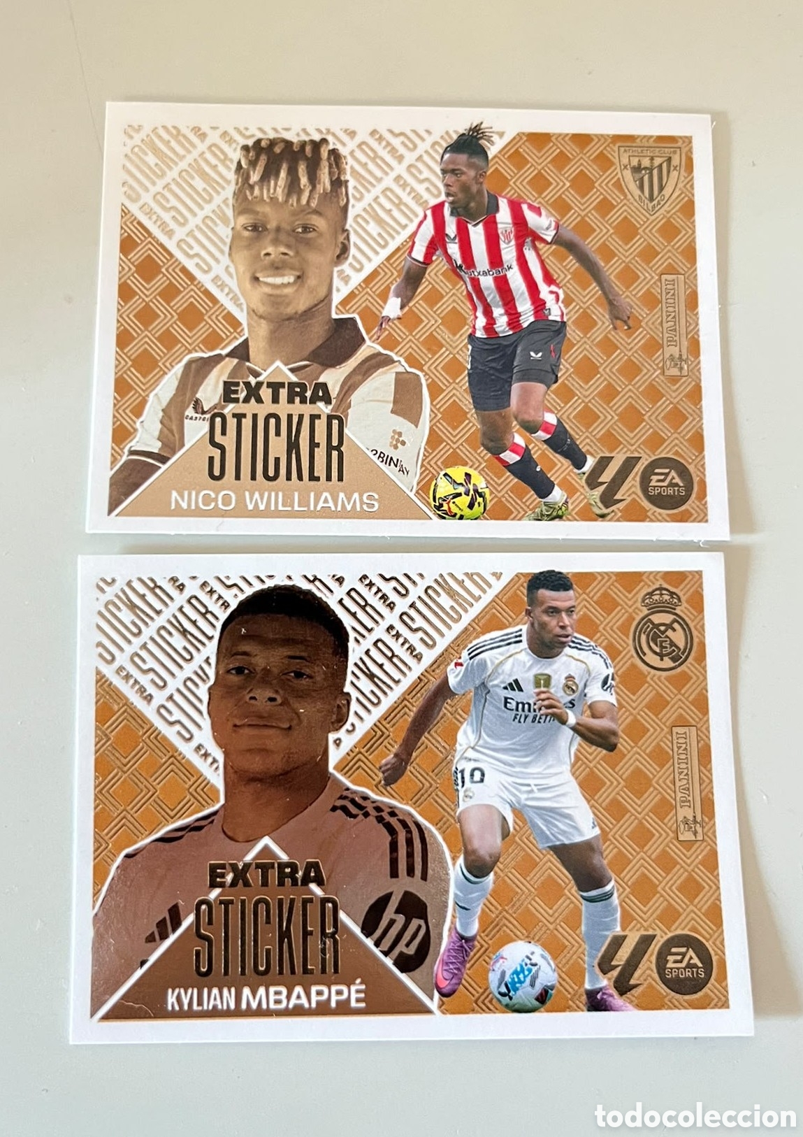Cromos de f&uacute;tbol: MBAPP&Eacute; Y NICO WILLIAMS EXTRA STICKER BRONCE &ndash; LIGA ESTE 2026-27