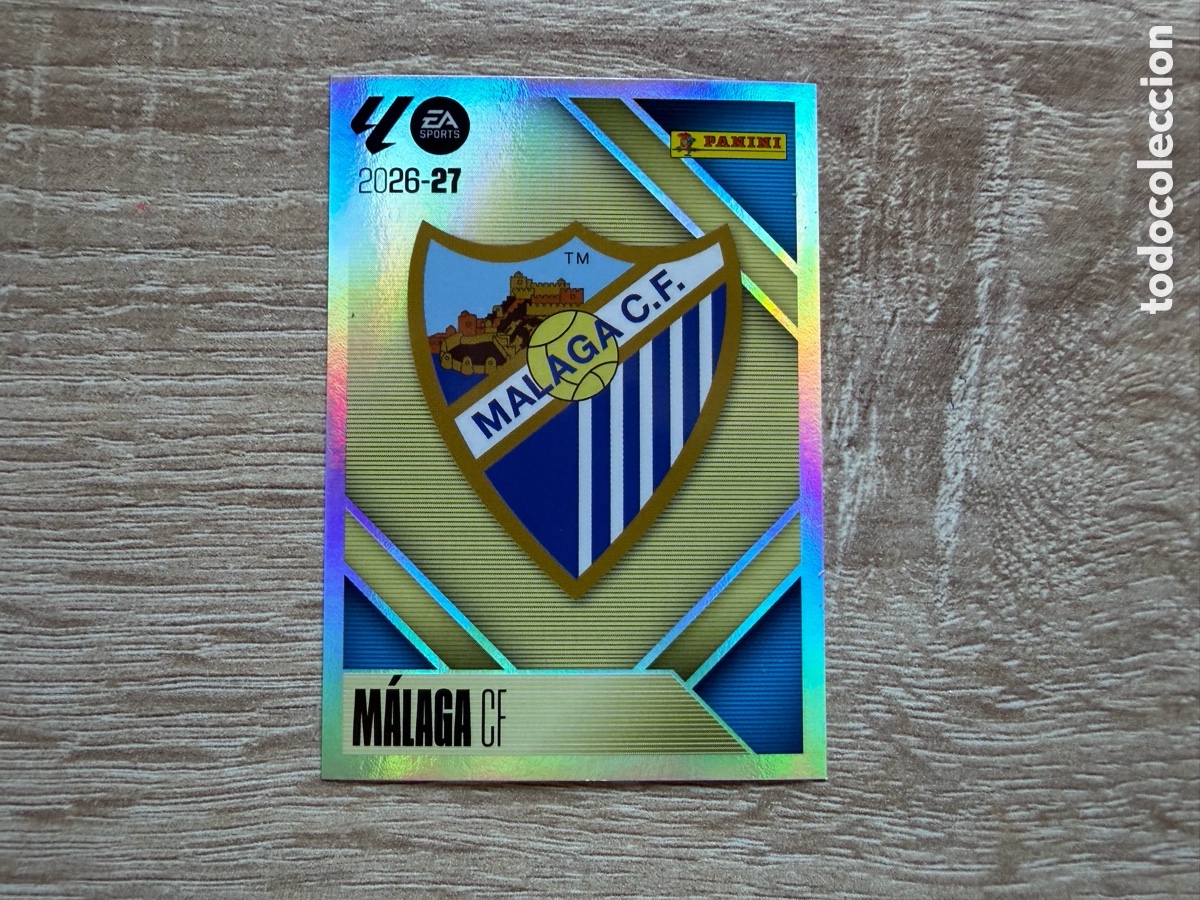 Cromos de f&uacute;tbol: ESCUDO M&Aacute;LAGA CF COLECCIONES ESTE LIGA 2026 2027 26 27