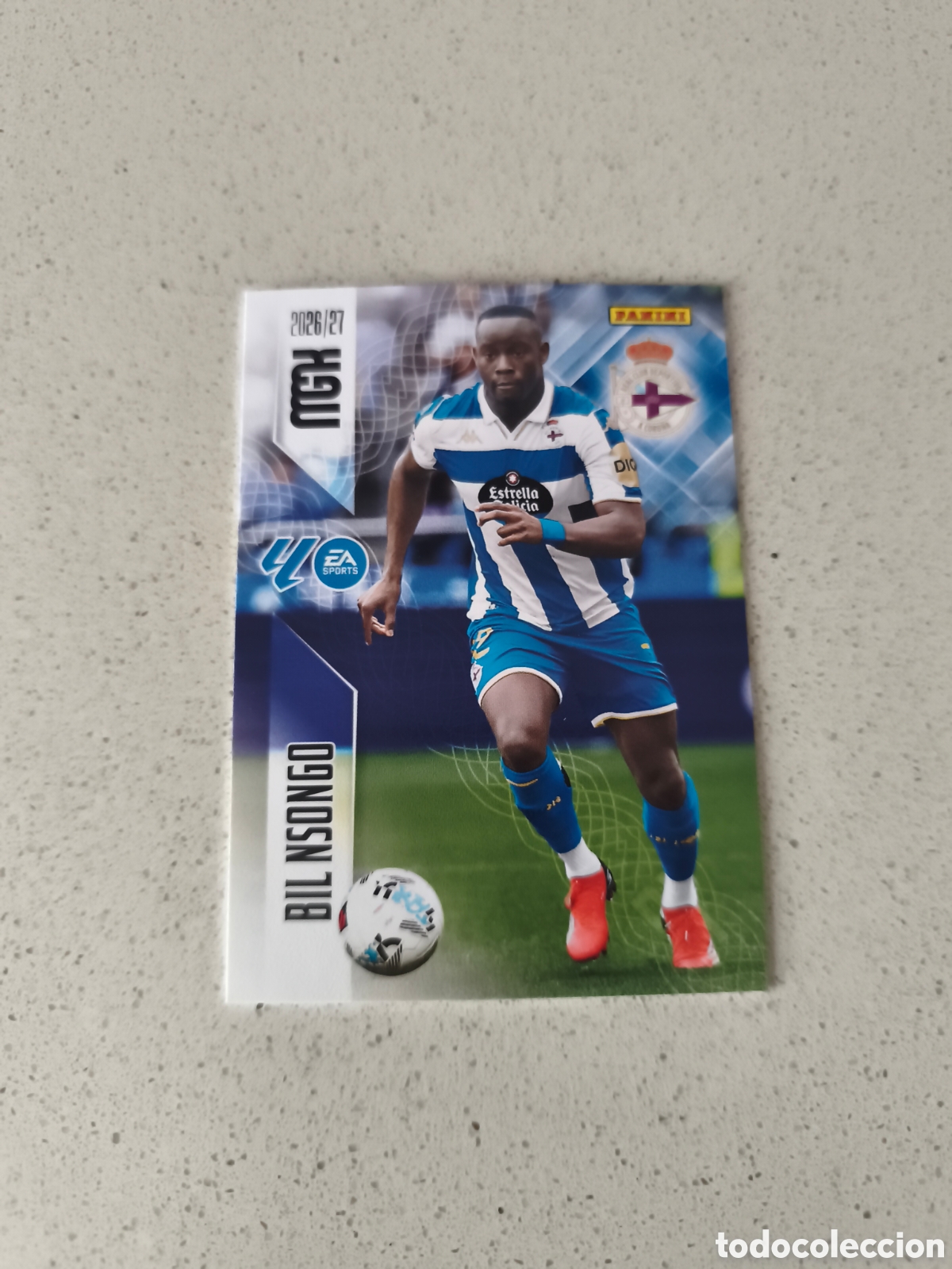 Fu&szlig;ball-Sticker: CARTA N&Uacute;MERO 144 NSONGO DEPORTIVO DE LA CORU&Ntilde;A. MEGACRACKS 26/27. PANINI.