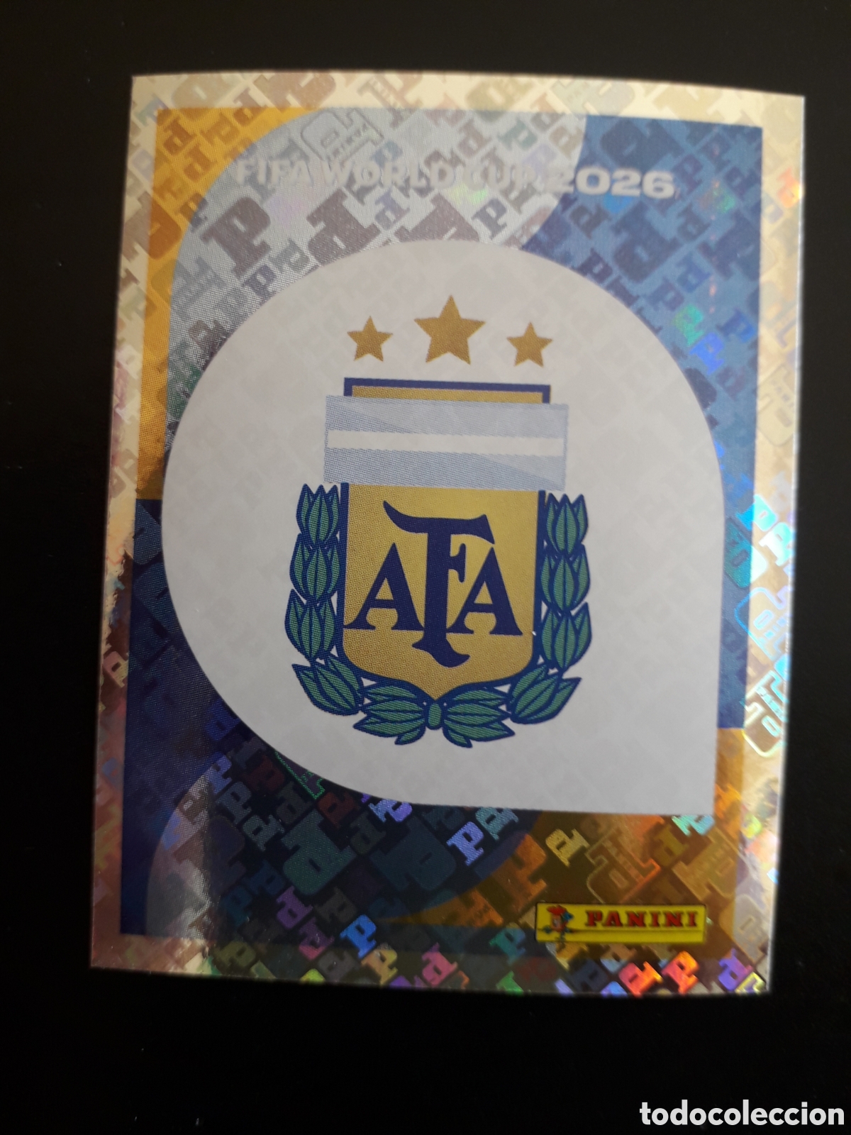 Fu&szlig;ball-Sticker: ESCUDO ARGENTINA ARG 1 MUNDIAL F&Uacute;TBOL 2026 FIFA WORLD CUP PANINI SIN PEGAR PEDIDO M&Iacute;NIMO 3&euro;