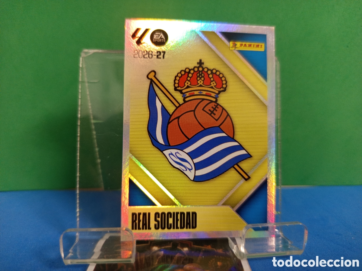 Cromos de f&uacute;tbol: ❇️ CROMO ⚽ 1.- ESCUDO (R. SOCIEDAD) - COLECCIONES ESTE 2026/27 (PANINI) ❇️