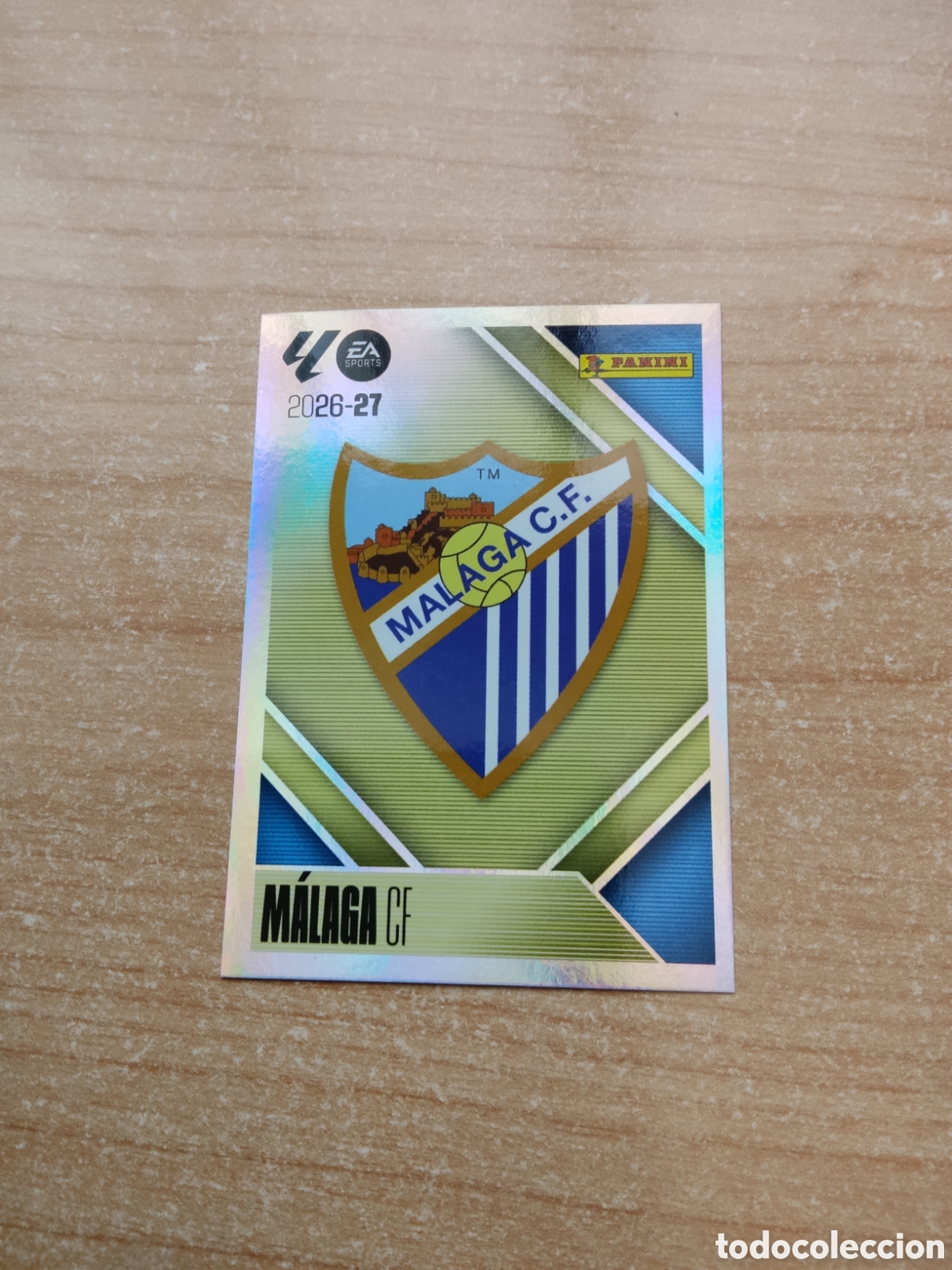 Cromos de f&uacute;tbol: 1 ESCUDO MALAGA LIGA ESTE 2026 2027
