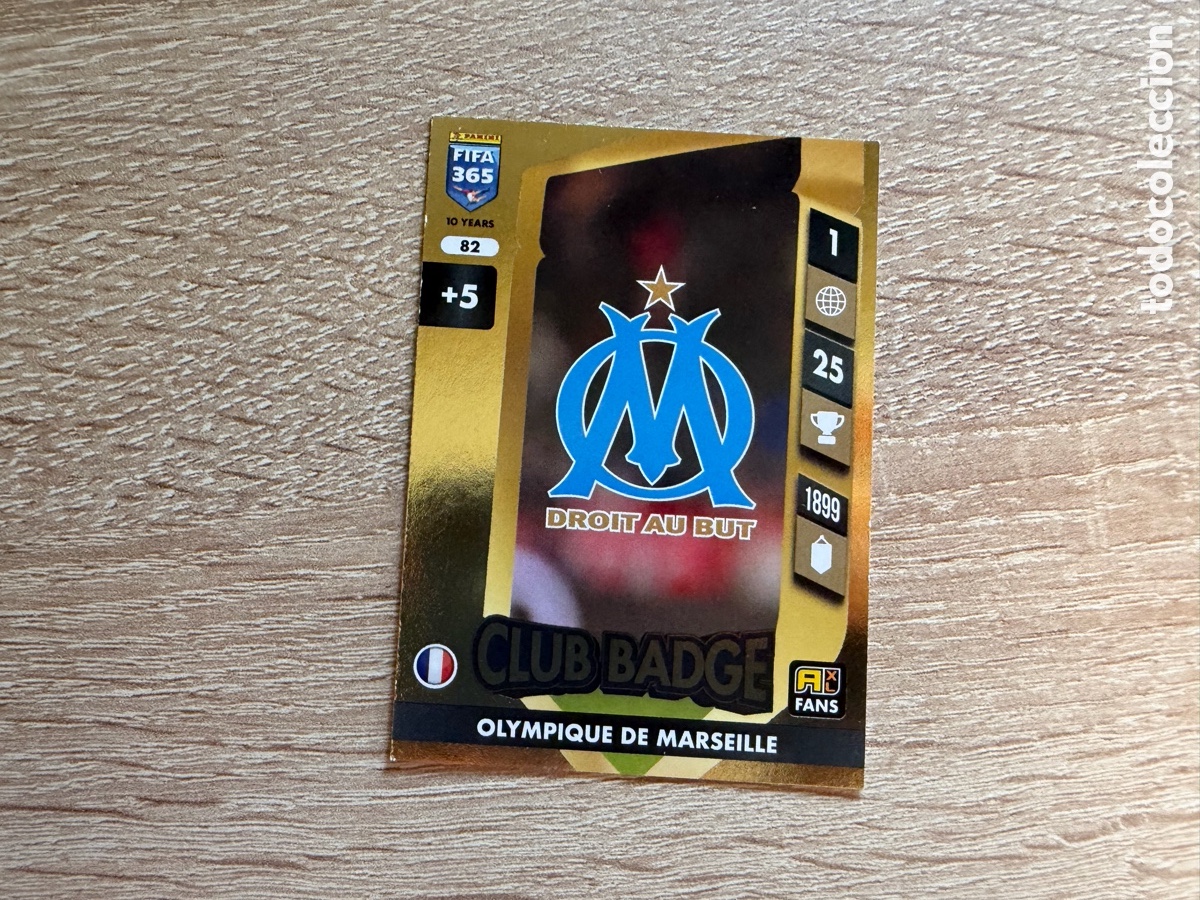 Cromos de f&uacute;tbol: 82 ESCUDO OLYMPIQUE DE MARSEILLE CLUB BADGE FIFA 365 2025 ADRENALYN XL PANINI