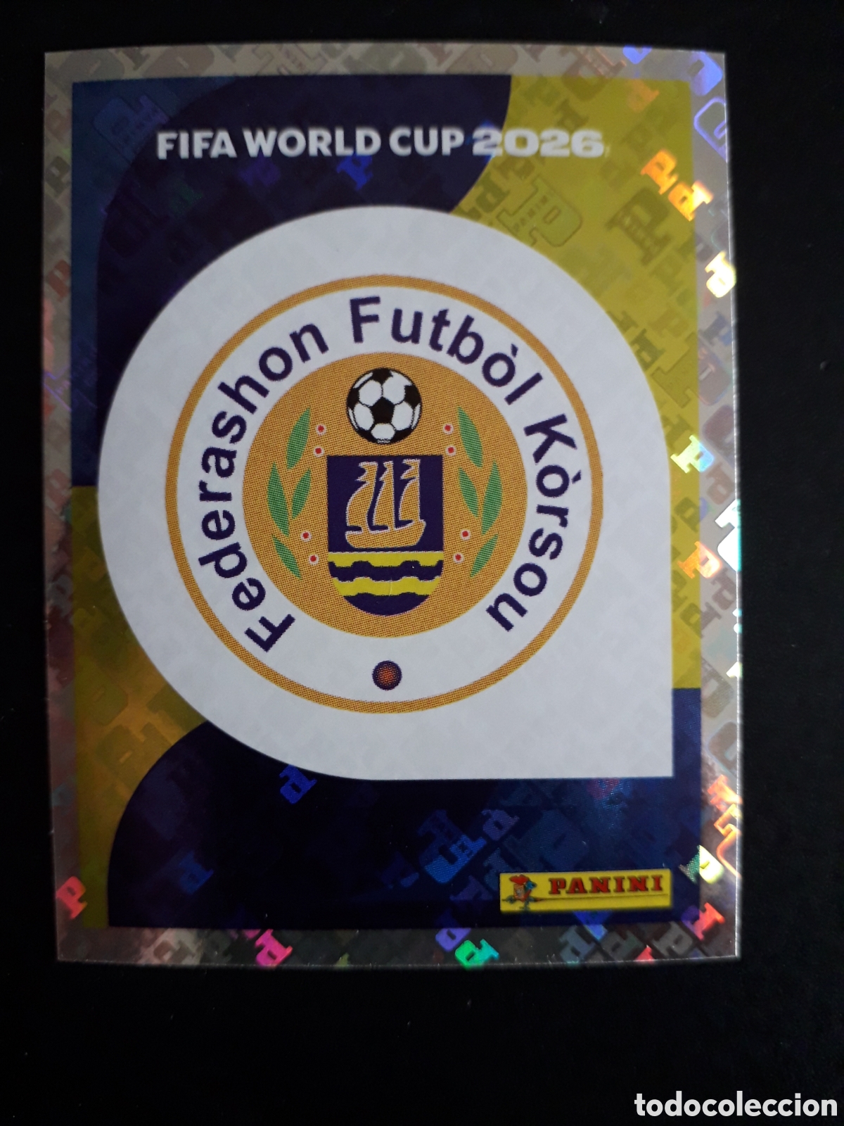 Cromos de f&uacute;tbol: ESCUDO CURA&Ccedil;AO CUW 1 MUNDIAL F&Uacute;TBOL 2026 FIFA WORLD CUP PANINI SIN PEGAR PEDIDO M&Iacute;NIMO 3&euro;