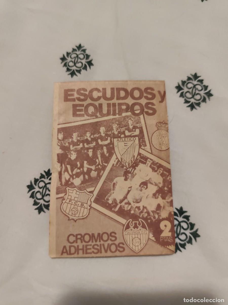 Cromos de f&uacute;tbol: Sobre sin abrir ESCUDOS Y EQUIPOS Este 75 76