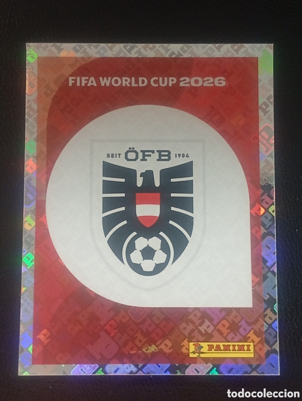 Cromos de f&uacute;tbol: AUT 1 escudo AUSTRIA MUNDIAL F&Uacute;TBOL 2026 FIFA WORLD CUP PANINI CROMO STICKER AUT1
