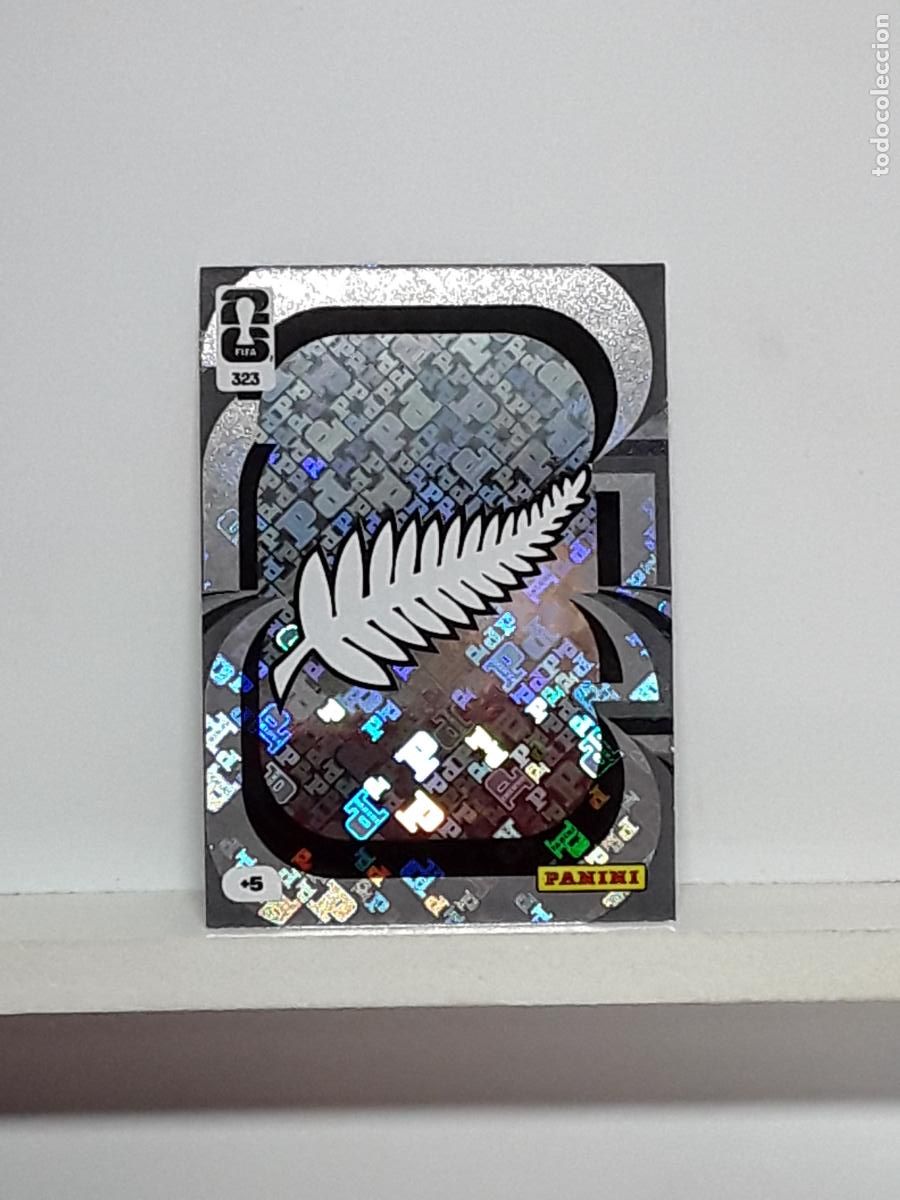 Cromos de f&uacute;tbol: ADRENALYN MUNDIAL 2026 WORLD CUP 26 ALBUM PANINI N 323 NUEVA ZELANDA ESCUDO LOGO