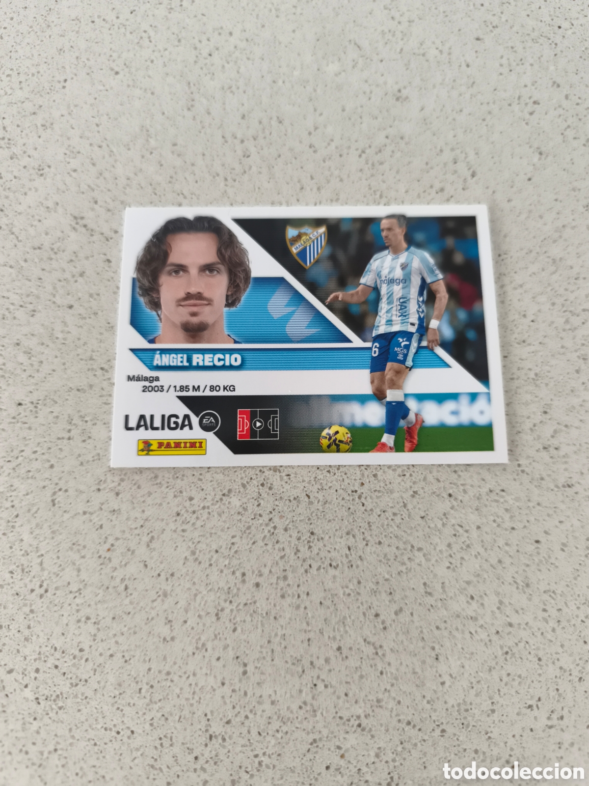 Fu&szlig;ball-Sticker: CROMO N&Uacute;MERO 6 BIS COLOCA RECIO M&Aacute;LAGA. LIGA ESTE 26/27. PANINI. TERCERA EDICI&Oacute;N.