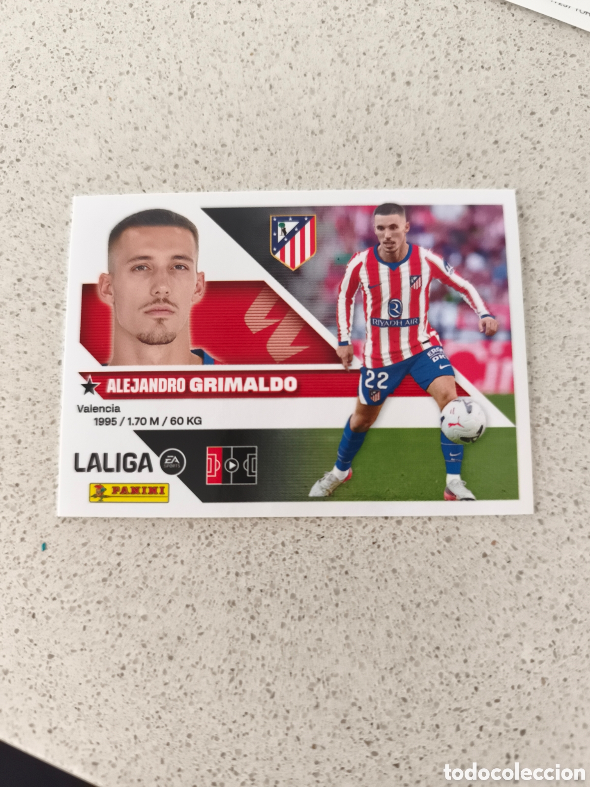 Cromos de f&uacute;tbol: CROMO N&Uacute;MERO 10 BIS COLOCA GRIMALDO ATL&Eacute;TICO DE MADRID. LIGA ESTE 26/27. PANINI. TERCERA EDICI&Oacute;N.