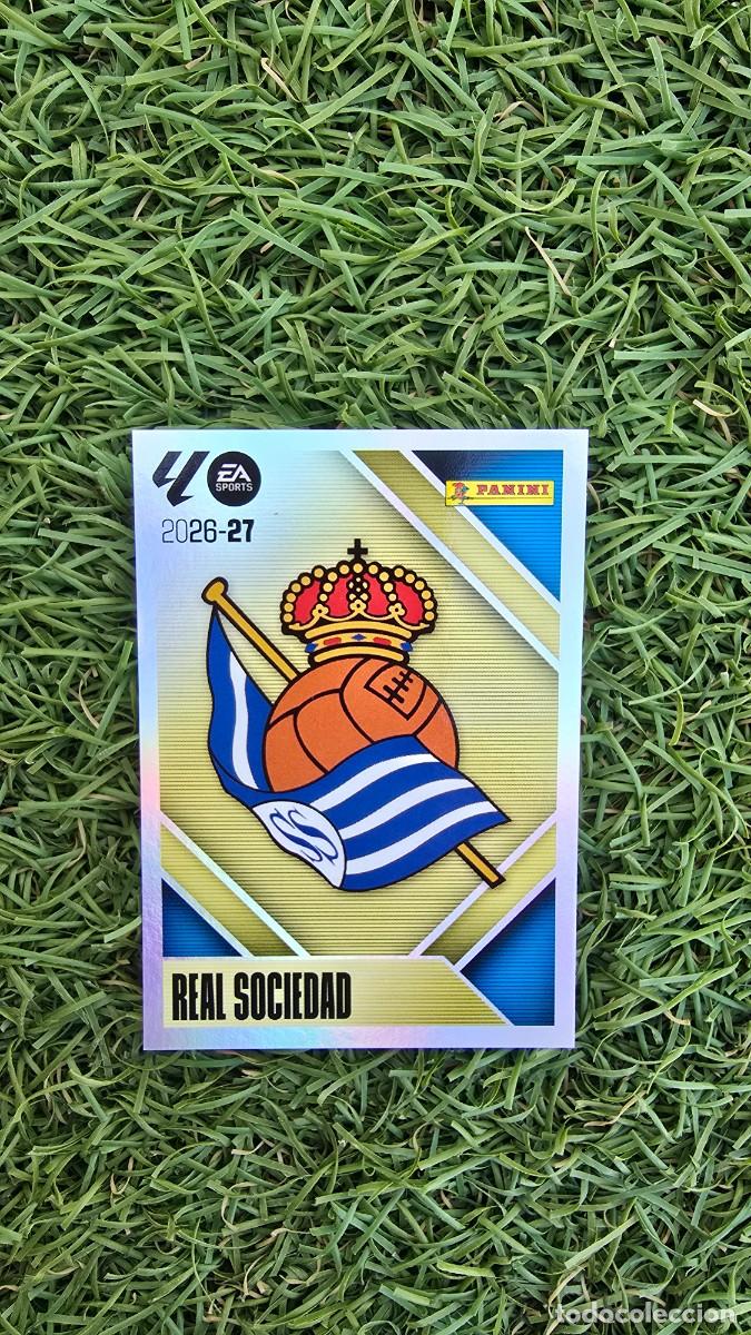 Cromos de f&uacute;tbol: ESCUDO 1 REAL SOCIEDAD LIGA ESTE 2026 2027 26 27 PANINI LALIGA EA SPORTS
