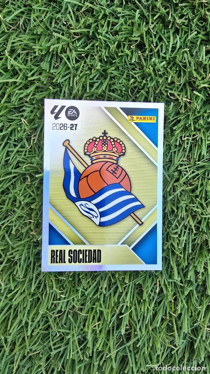 Cromos de f&uacute;tbol: ESCUDO 1 REAL SOCIEDAD LIGA ESTE 2026 2027 26 27 PANINI LALIGA EA SPORTS