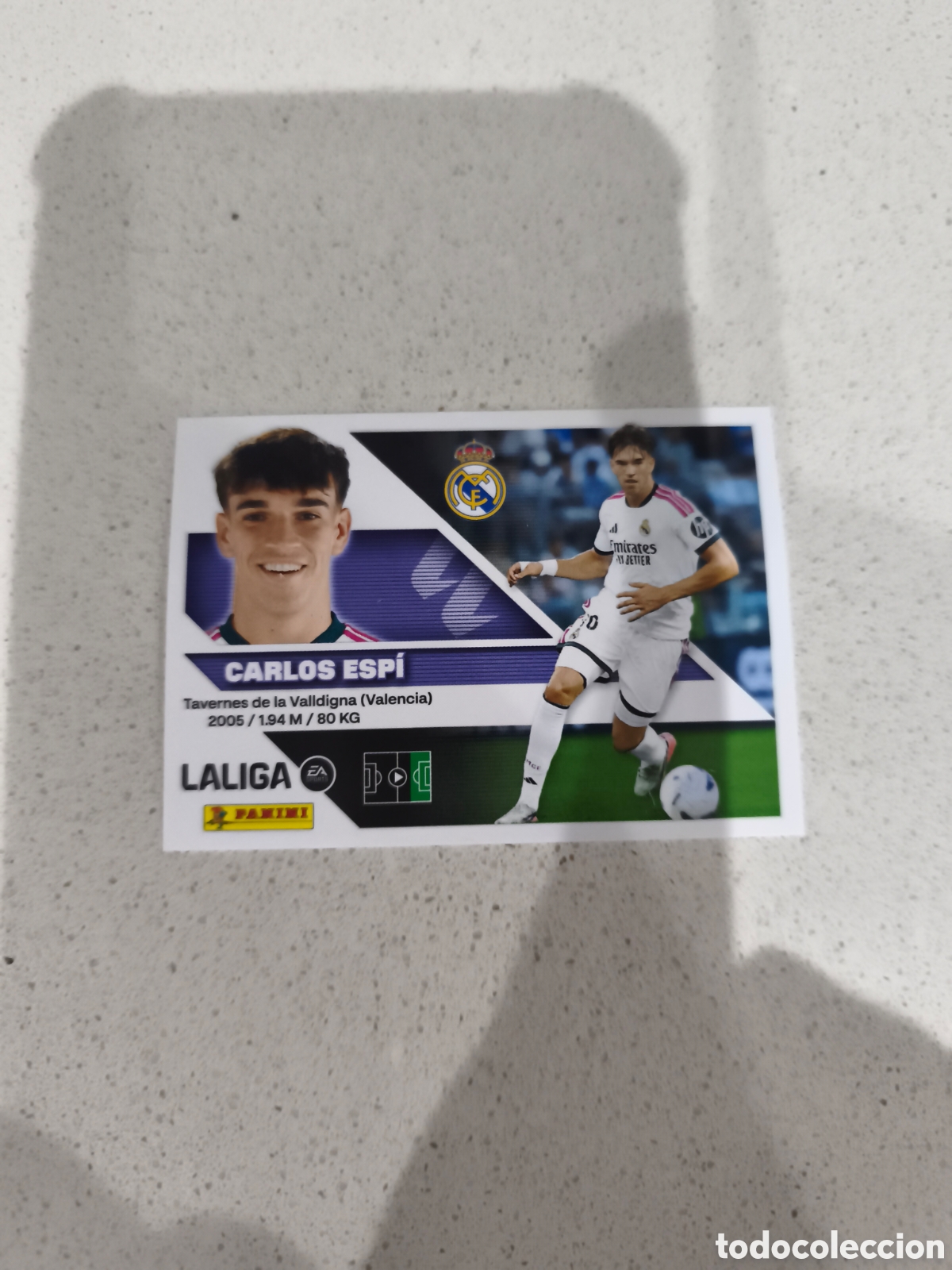 Cromos de Futebol: CROMO N&Uacute;MERO 17 BIS COLOCA ESP&Iacute; REAL MADRID. LIGA ESTE 26/27. PANINI. SEGUNDA EDICI&Oacute;N.