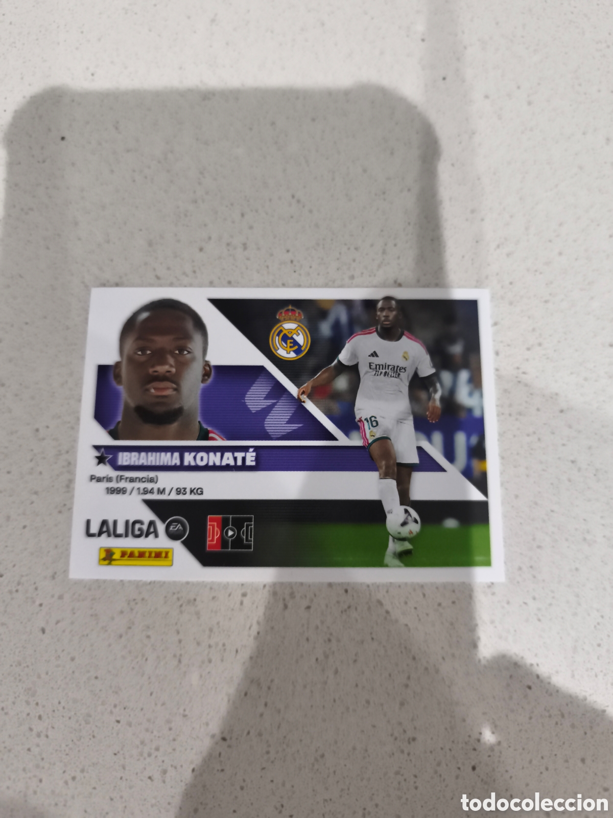 Cartes &agrave; collectionner de Football: CROMO N&Uacute;MERO 7 BIS COLOCA KONAT&Eacute; REAL MADRID. LIGA ESTE 26/27. PANINI. TERCERA EDICI&Oacute;N.