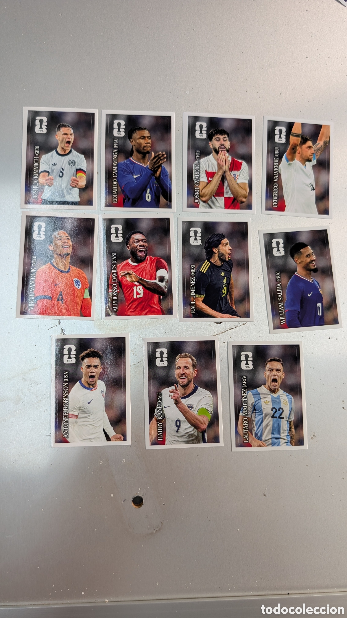 Fu&szlig;ball-Sticker: LOTE CASI COMPLETO 11 CROMOS DIFERENTES COCA COLA MUNDIAL WORLD CUP 2026 26 NUNCA PEGADOS