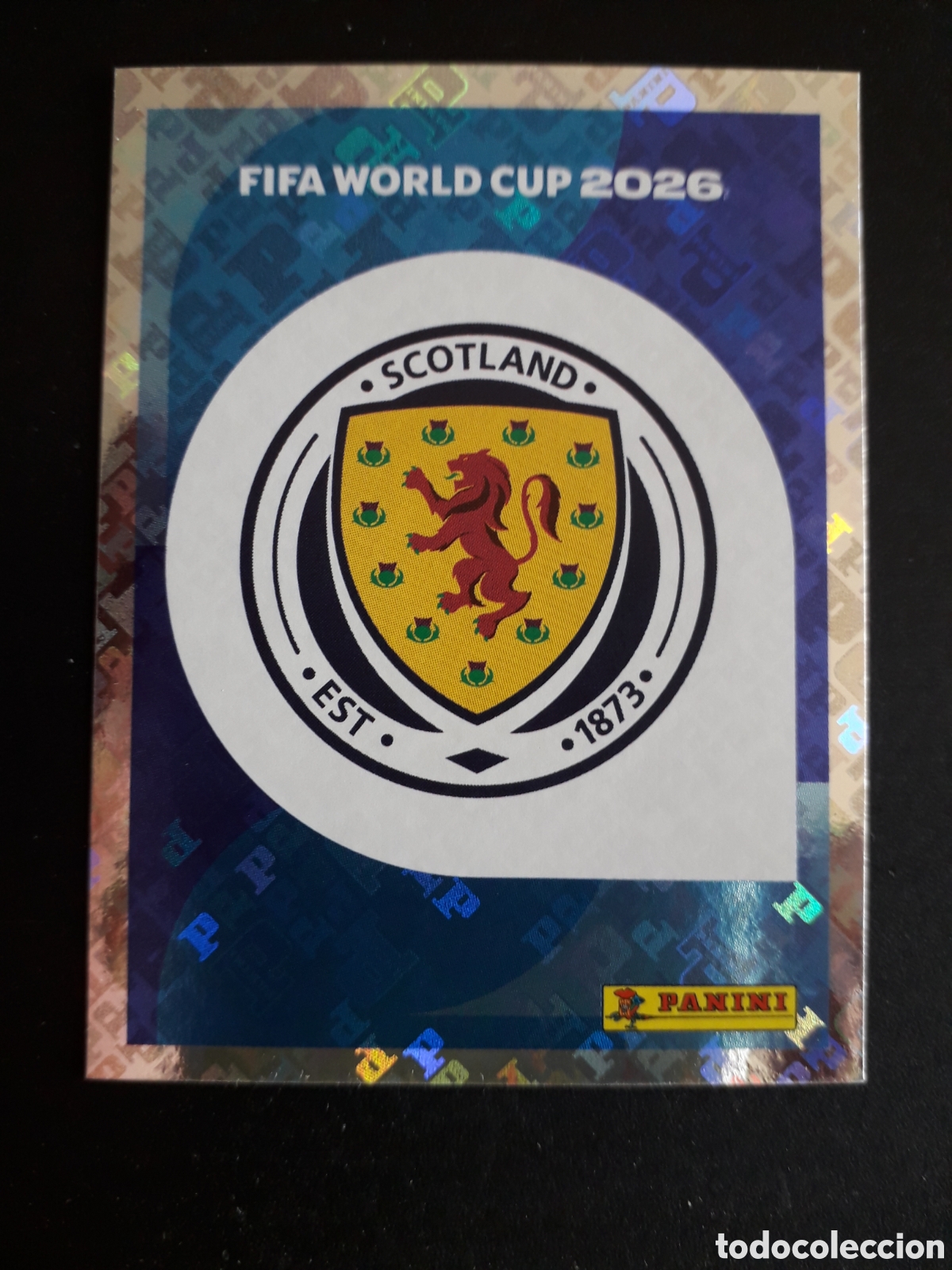 Cromos de f&uacute;tbol: ESCUDO ESCOCIA SCO 1 MUNDIAL F&Uacute;TBOL 2026 FIFA WORLD CUP PANINI SIN PEGAR PEDIDO M&Iacute;NIMO 3&euro;.