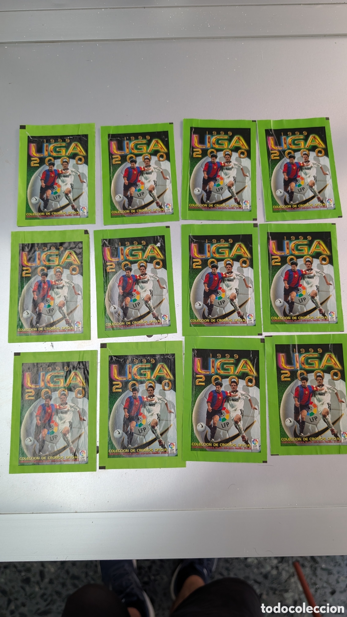 Cromos de f&uacute;tbol: LOTE 12 SOBRES DE CROMOS VACIOS LIGA ESTE 1999/00 99 00 ABIERTOS Y VACIOS