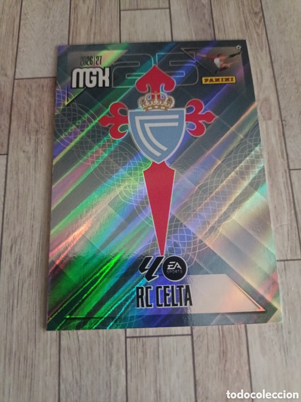 Cromos de f&uacute;tbol: 109 ESCUDO REAL CLUB CELTA DE VIGO MEGACRACKS MGK 26 27 PANINI 2026 2027