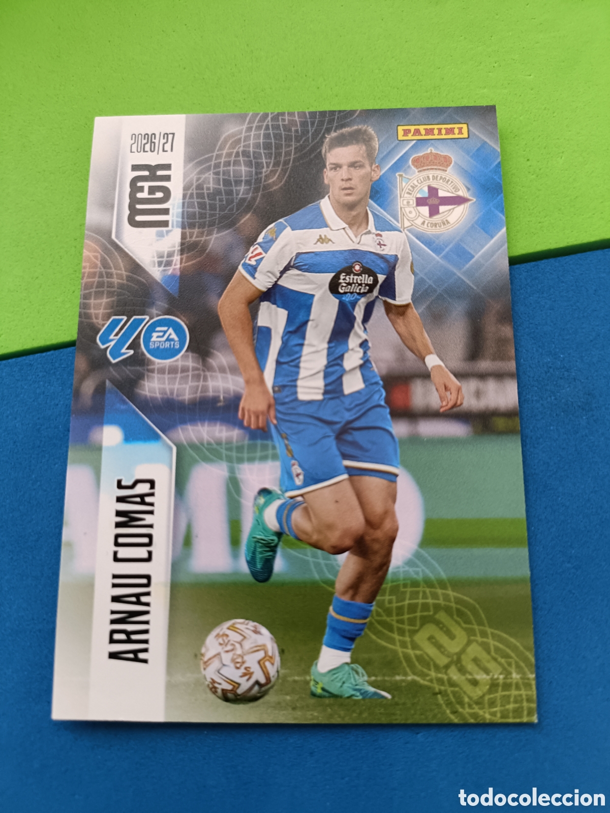 Cromos de f&uacute;tbol: PANINI 2026 2027 MGK MEGACRACKS 25 Aniversario - Deportivo Coru&ntilde;a 134 Arnau Comas