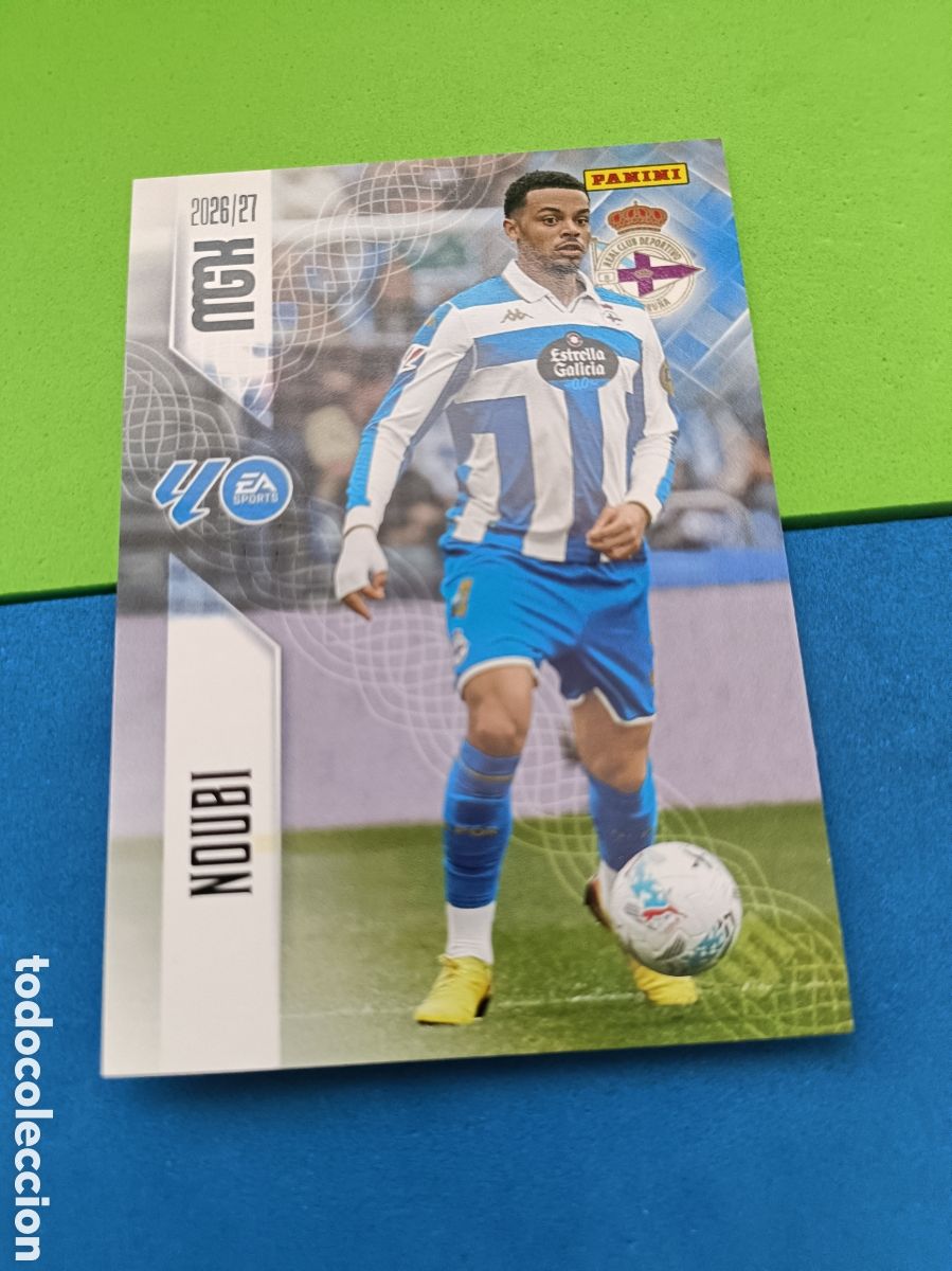 Cromos de f&uacute;tbol: PANINI 2026 2027 MGK MEGACRACKS 25 Aniversario - Deportivo Coru&ntilde;a 132 Noubi