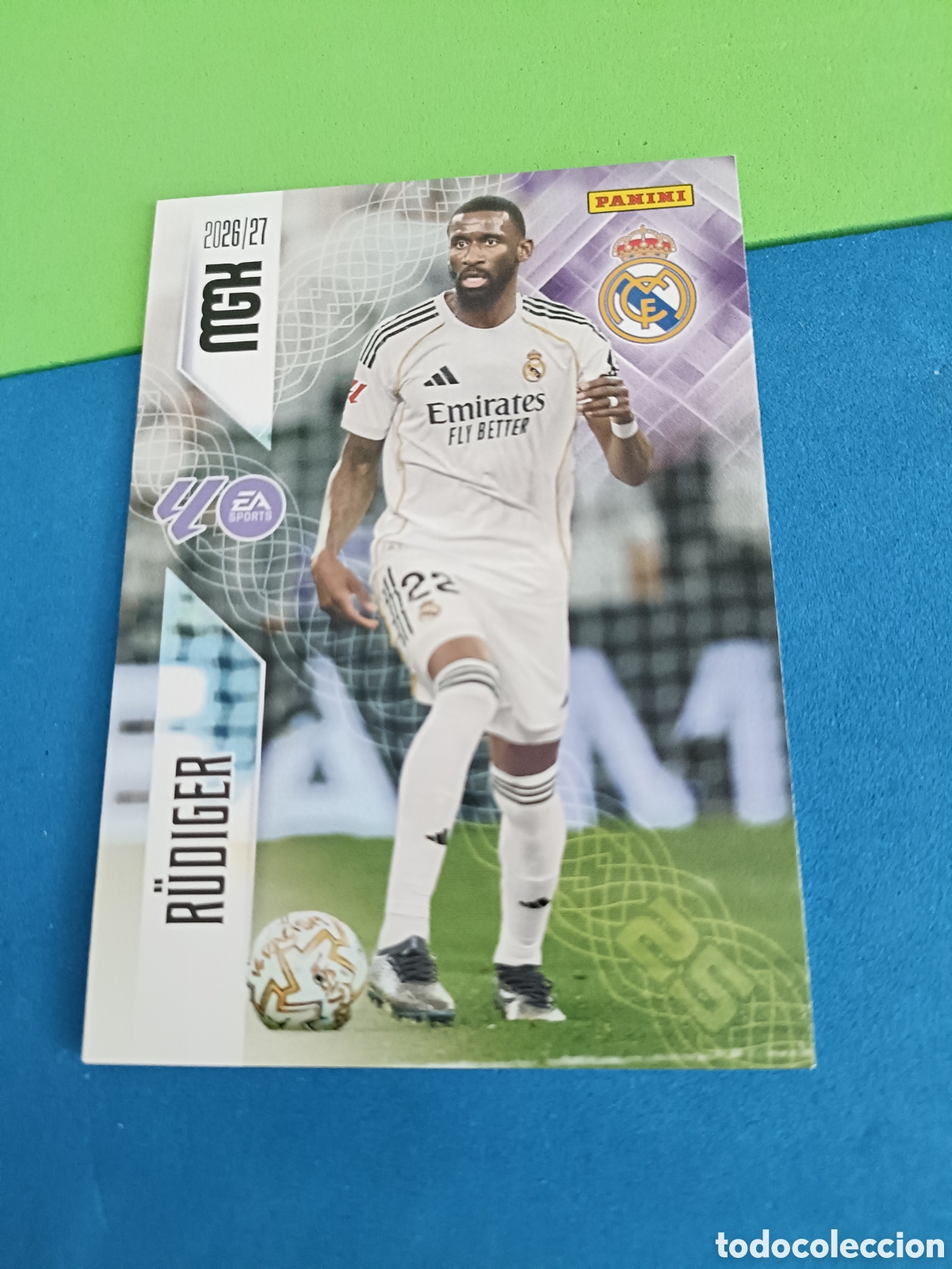 Cromos de f&uacute;tbol: PANINI 2026 2027 MGK MEGACRACKS 25 Aniversario - Real Madrid 223 R&uuml;diger