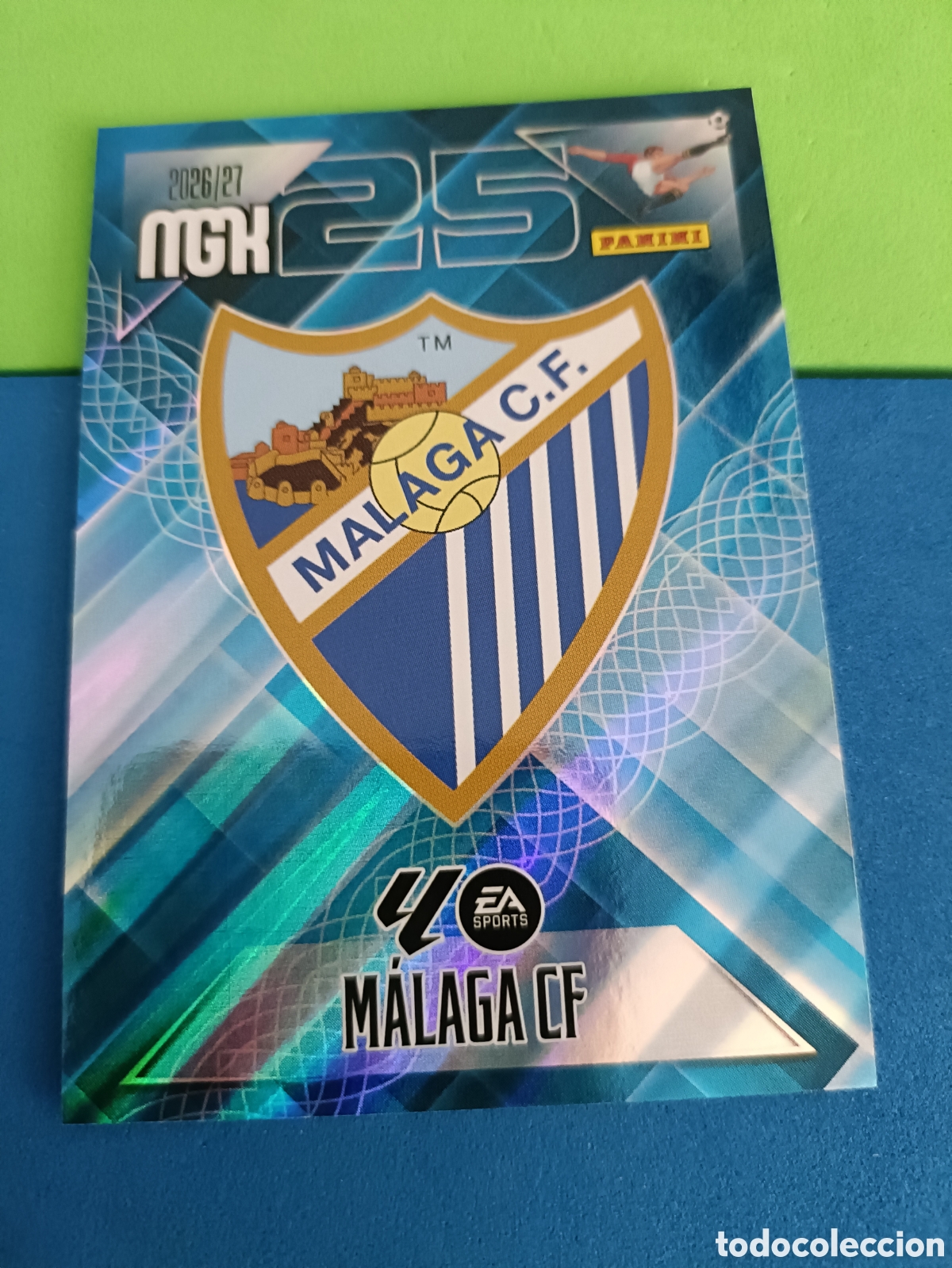 Cromos de f&uacute;tbol: PANINI 2026 2027 MGK MEGACRACKS 25 Aniversario - M&aacute;laga 235 Escudo
