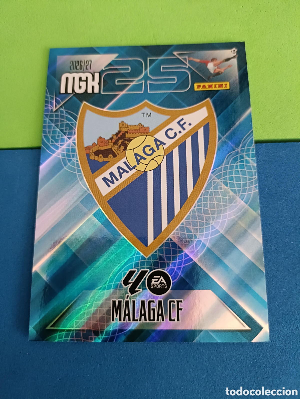 Cromos de f&uacute;tbol: PANINI 2026 2027 MGK MEGACRACKS 25 Aniversario - M&aacute;laga 235 Escudo
