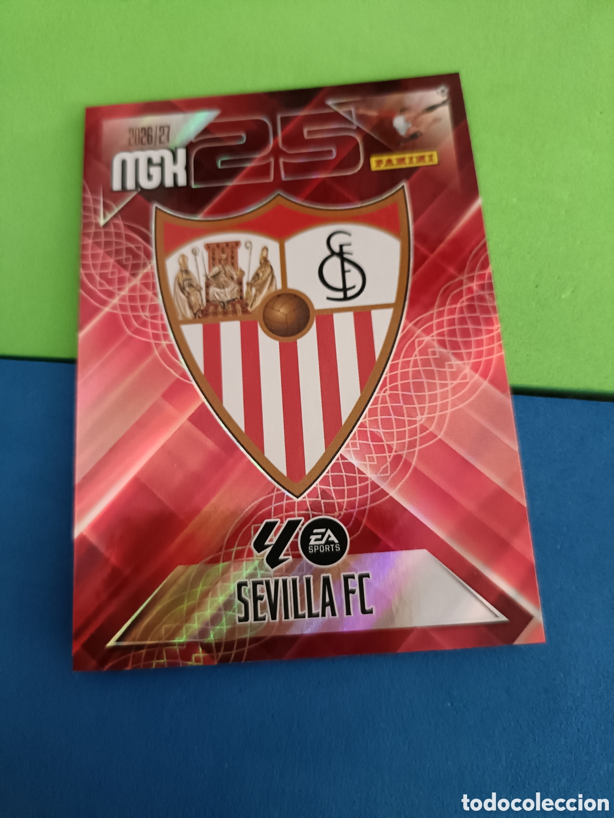 Football Stickers: PANINI 2026 2027 MGK MEGACRACKS 25 Aniversario - Sevilla 325 Escudo