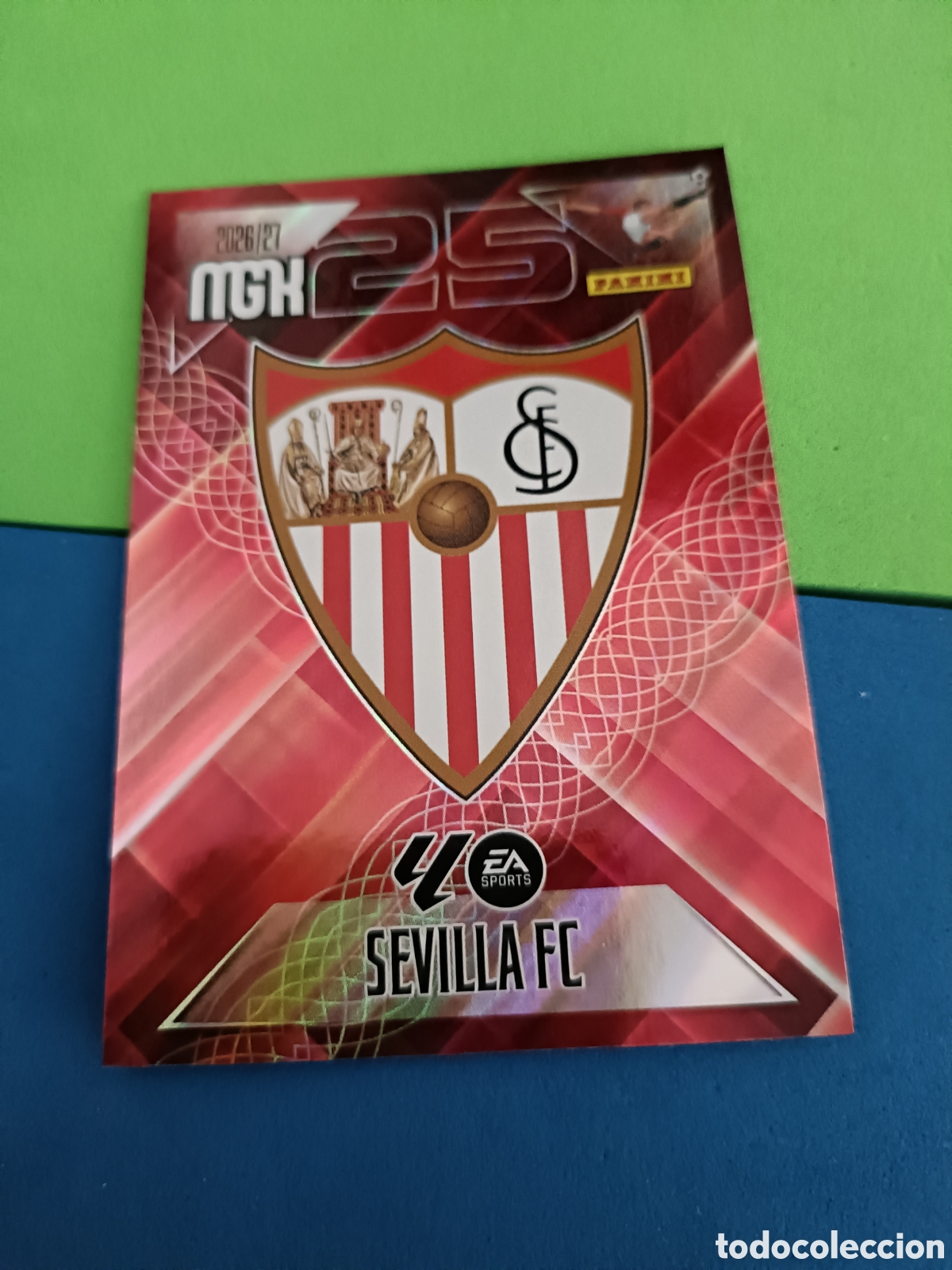 Football Stickers: PANINI 2026 2027 MGK MEGACRACKS 25 Aniversario - Sevilla 325 Escudo
