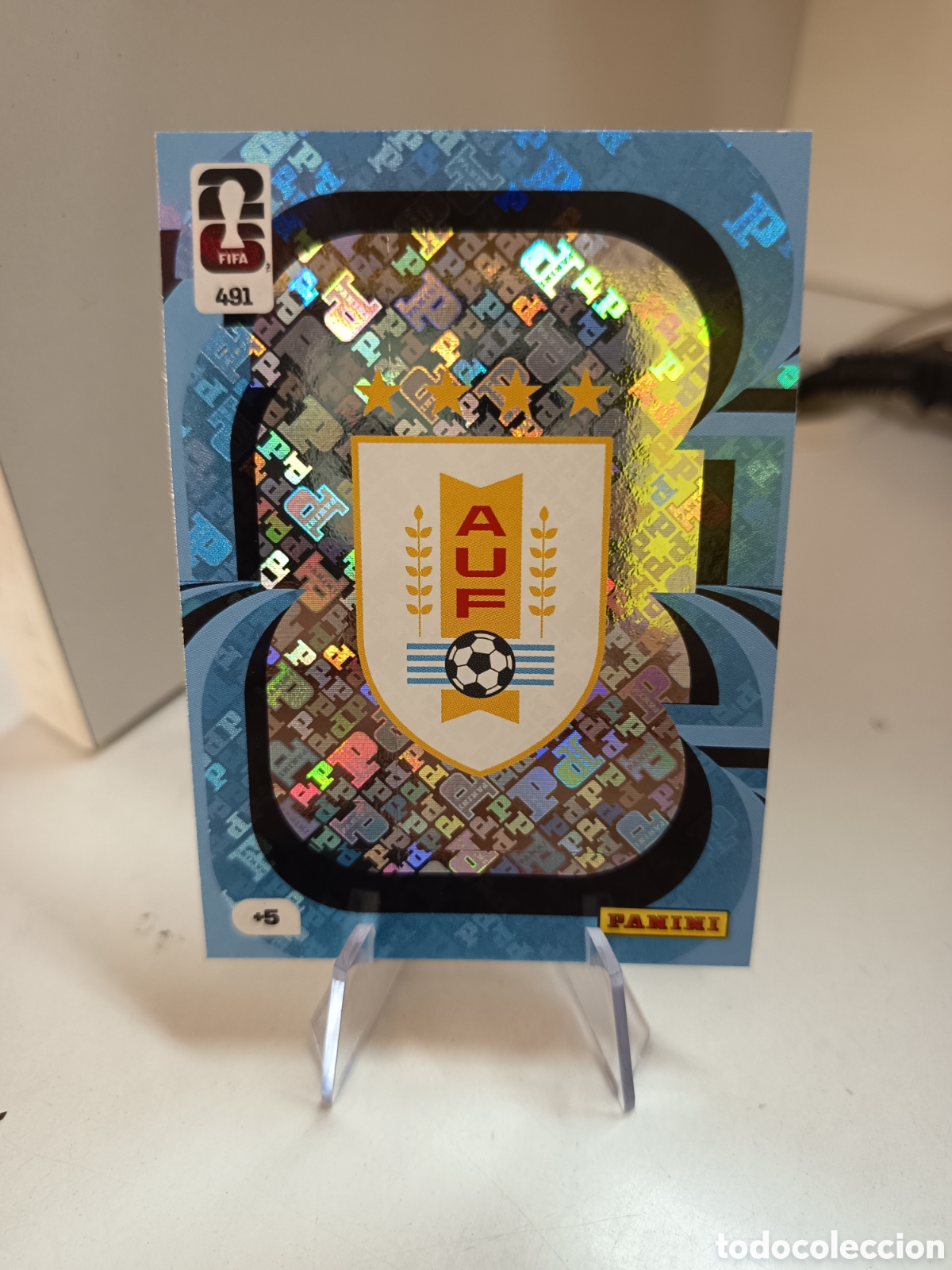 Fu&szlig;ball-Sticker: 491 ESCUDO URUGUAY WORLD CUP 2026 ADRENALYN MUNDIAL