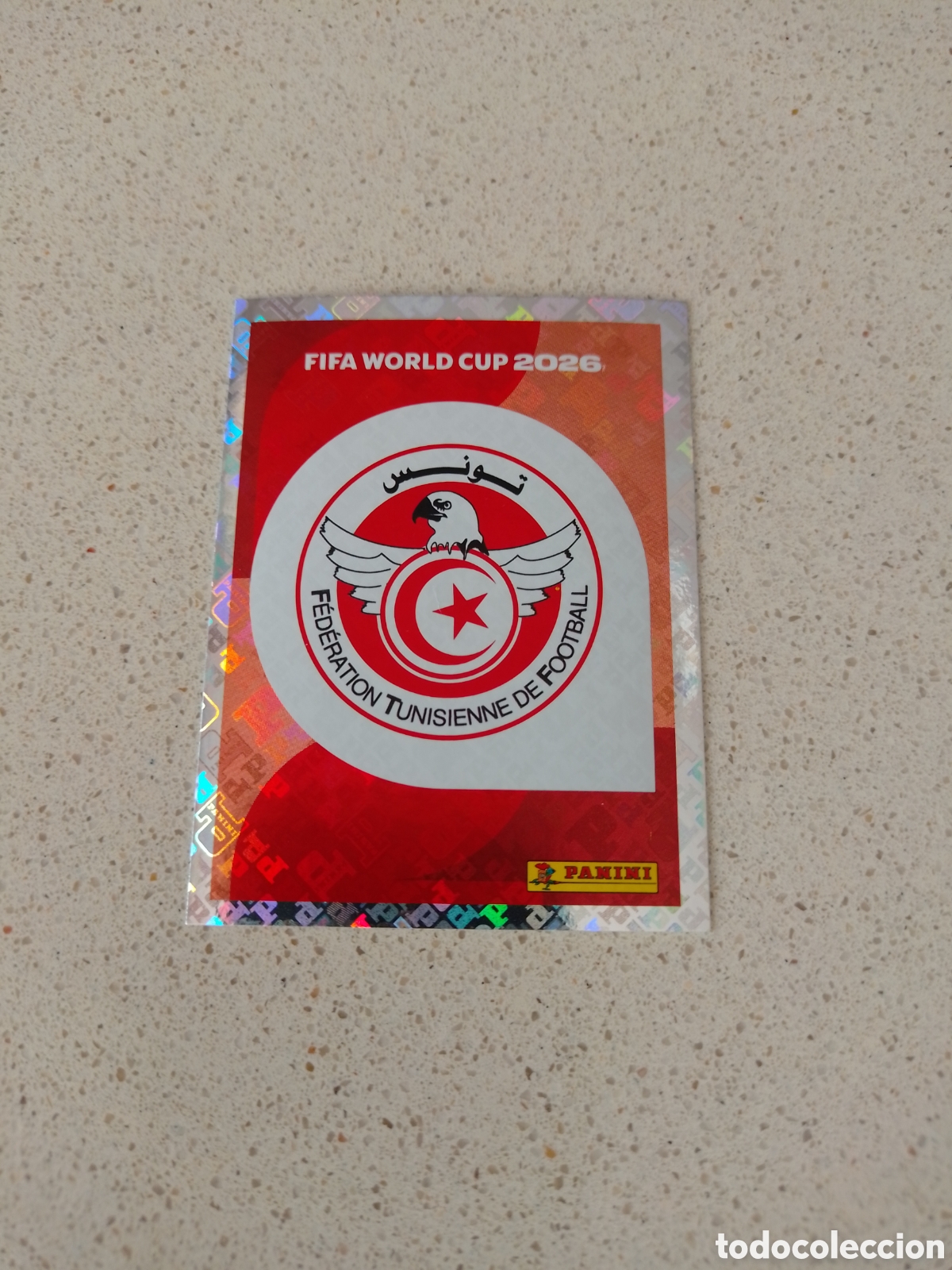 Cromos de f&uacute;tbol: CROMO NUMERO 1 ESCUDO TUNEZ. MUNDIAL 2026. PANINI.