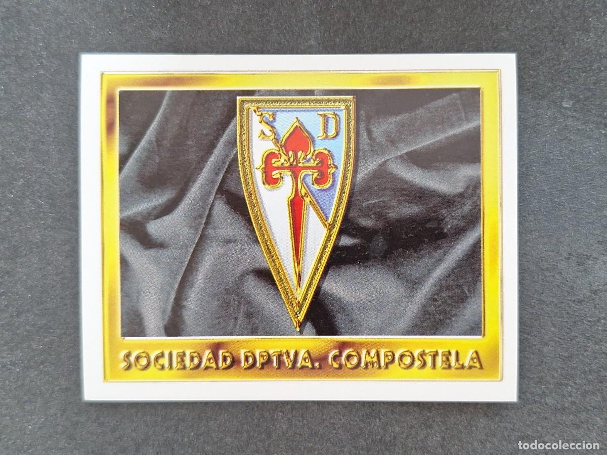 Cromos de f&uacute;tbol: L3 ESCUDO S. D. COMPOSTELA LIGA ESTE 1995 1996 95 96 NUNCA PEGADO SIN PEGAR