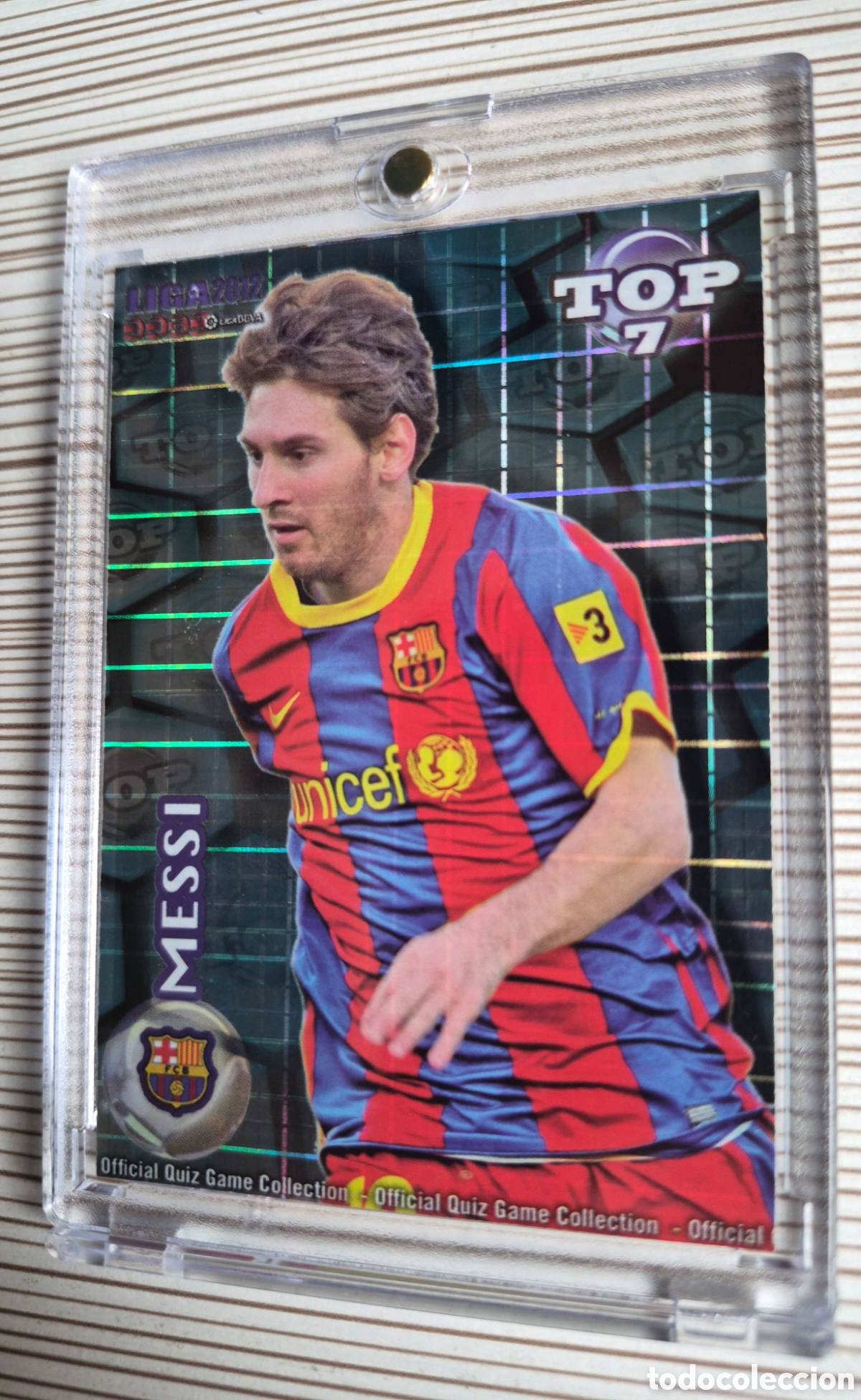 Cromos de f&uacute;tbol: MESSI #595 TOP AZUL FONDO CUADROS MUNDICROMO 2011 2012 IMPOLUTO