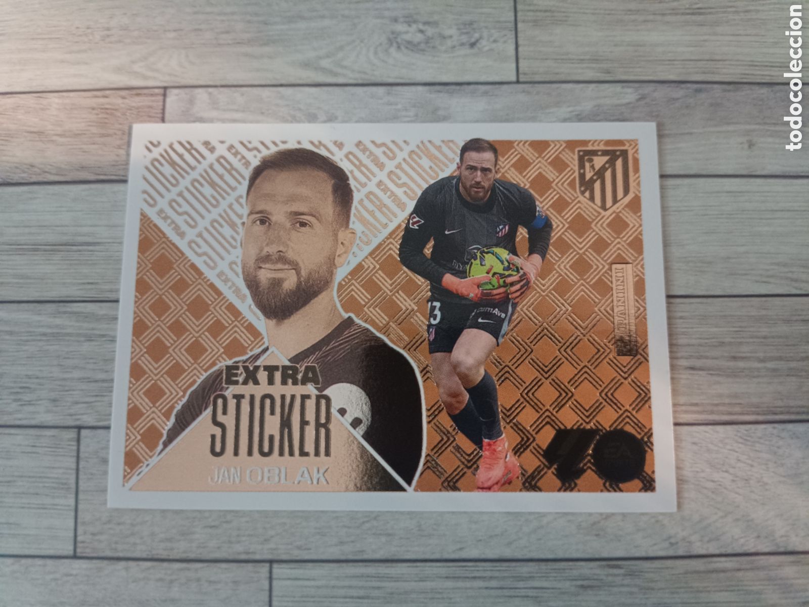 Cromos de f&uacute;tbol: JAN OBLAK ATLETICO DE MADRID BRONCE EXTRA STICKER LIGA ESTE 2026 2027 PANINI 26 27