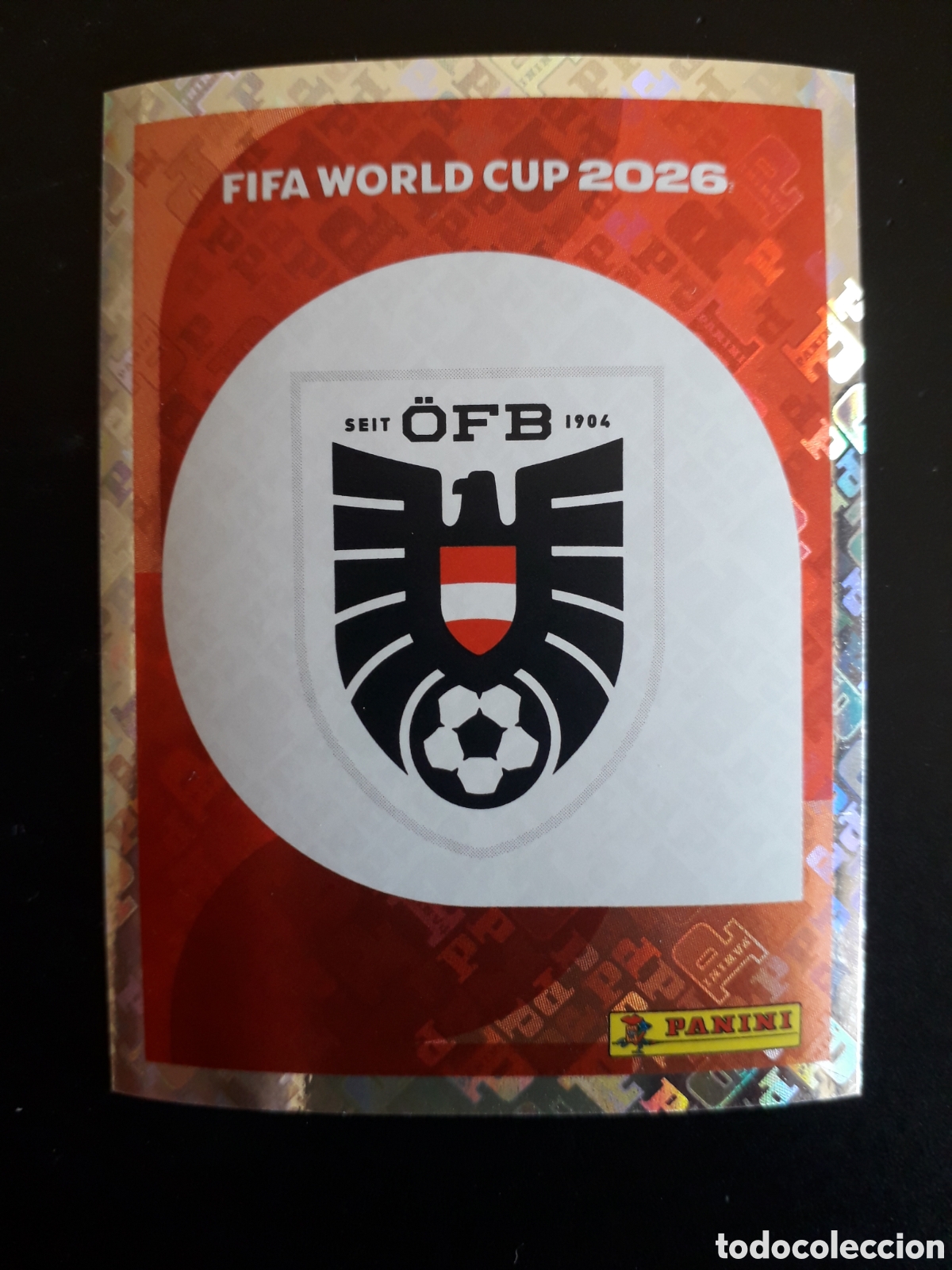 Cromos de f&uacute;tbol: ESCUDO AUSTRIA AUT 1 MUNDIAL F&Uacute;TBOL 2026 FIFA WORLD CUP PANINI SIN PEGAR PEDIDO M&Iacute;NIMO 3&euro;