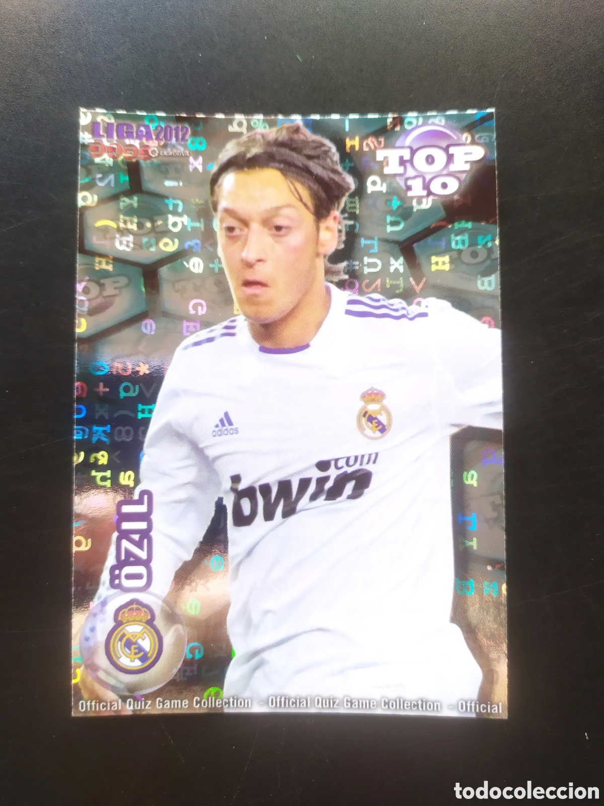 Cromos de f&uacute;tbol: Mundicromo fichas Liga 2011 2012 11 12 Ozil top brillo letras n&deg; 614 Real Madrid