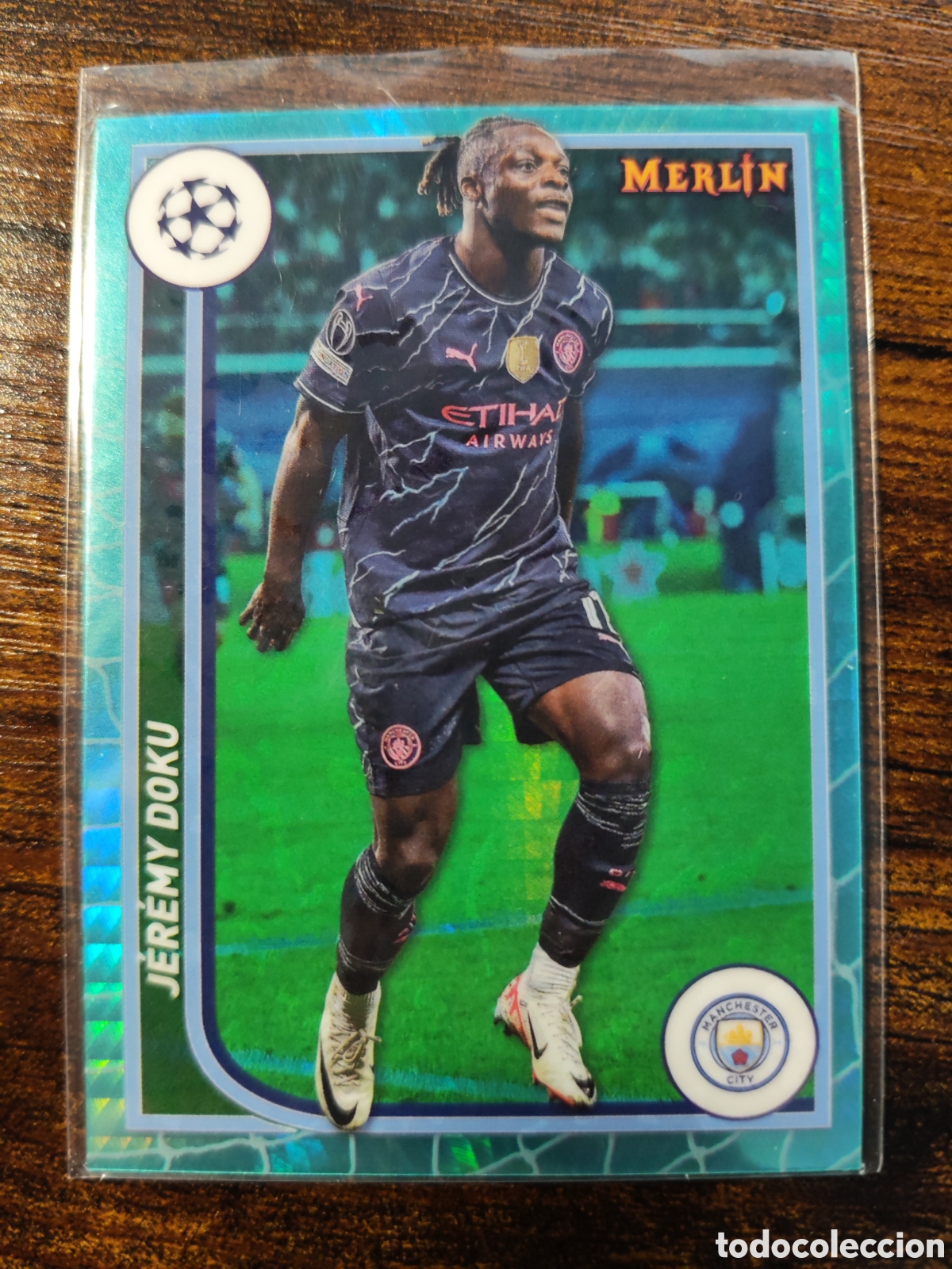 Cromos de f&uacute;tbol: Jeremy Doku Manchester City Aqua Prism Topps Merlin UCL 23-24 #77