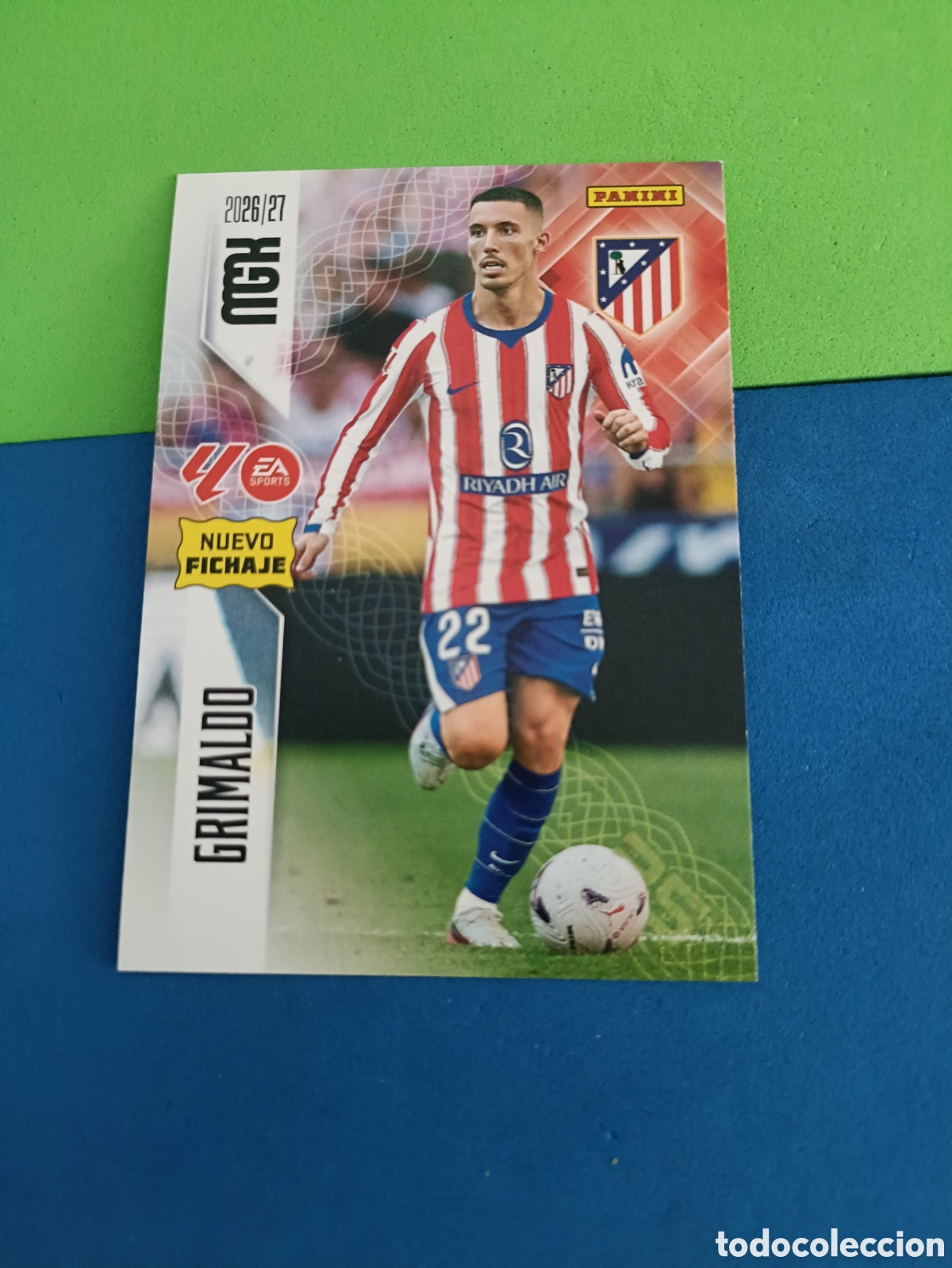Cromos de f&uacute;tbol: PANINI 2026 2027 MGK MEGACRACKS 25 Aniversario - Fichaje 459 Grimaldo Atl&eacute;tico Madrid