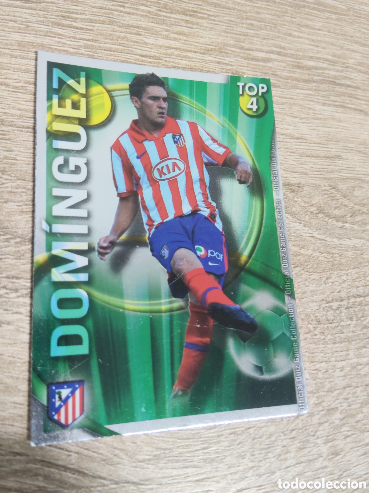 Fu&szlig;ball-Sticker: Mundicromo las fichas de la liga 2010 2011 10 11 562 Dom&iacute;nguez Atl&eacute;tico de Madrid fondo verde error