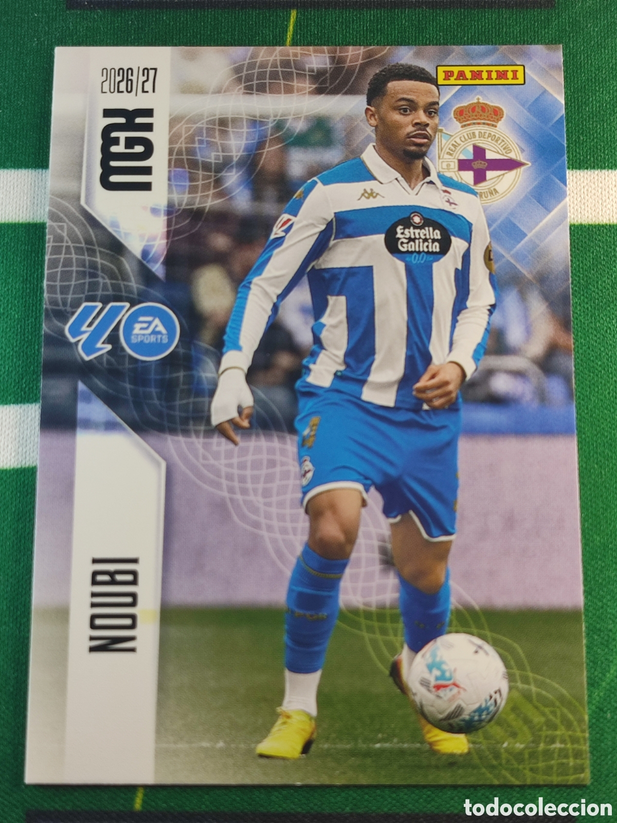 Fu&szlig;ball-Sticker: 132 Noubi RC Deportivo MEGACRACKS 2026 2027 - 26 27 MGK
