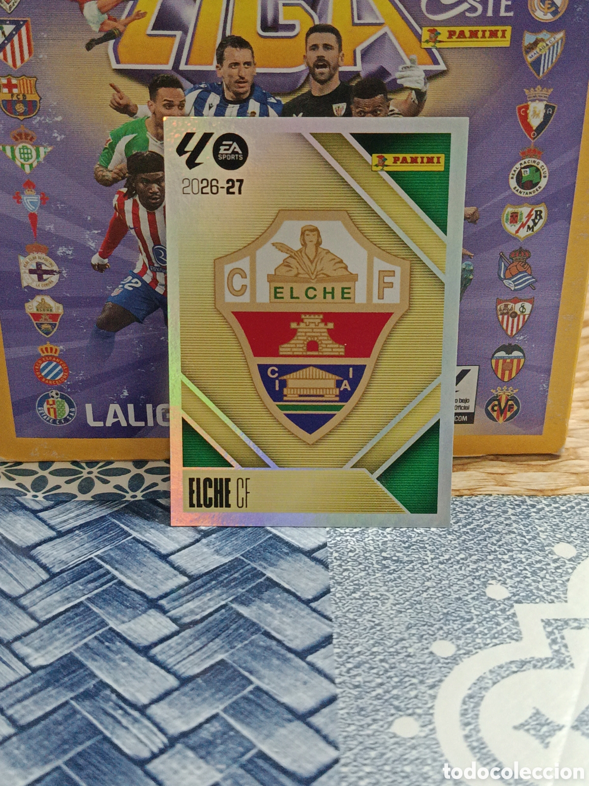 Cartes &agrave; collectionner de Football: ESCUDO ELCHE C.F. N&ordm; 1 LIGA ESTE 26 27 2026 2027 PANINI &rdquo;NUEVO DE SOBRE&rdquo;