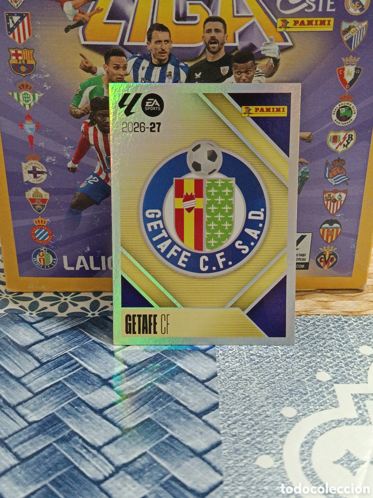 Cartes &agrave; collectionner de Football: ESCUDO GETAFE N&ordm; 1 LIGA ESTE 26 27 2026 2027 PANINI &rdquo;NUEVO DE SOBRE&rdquo;