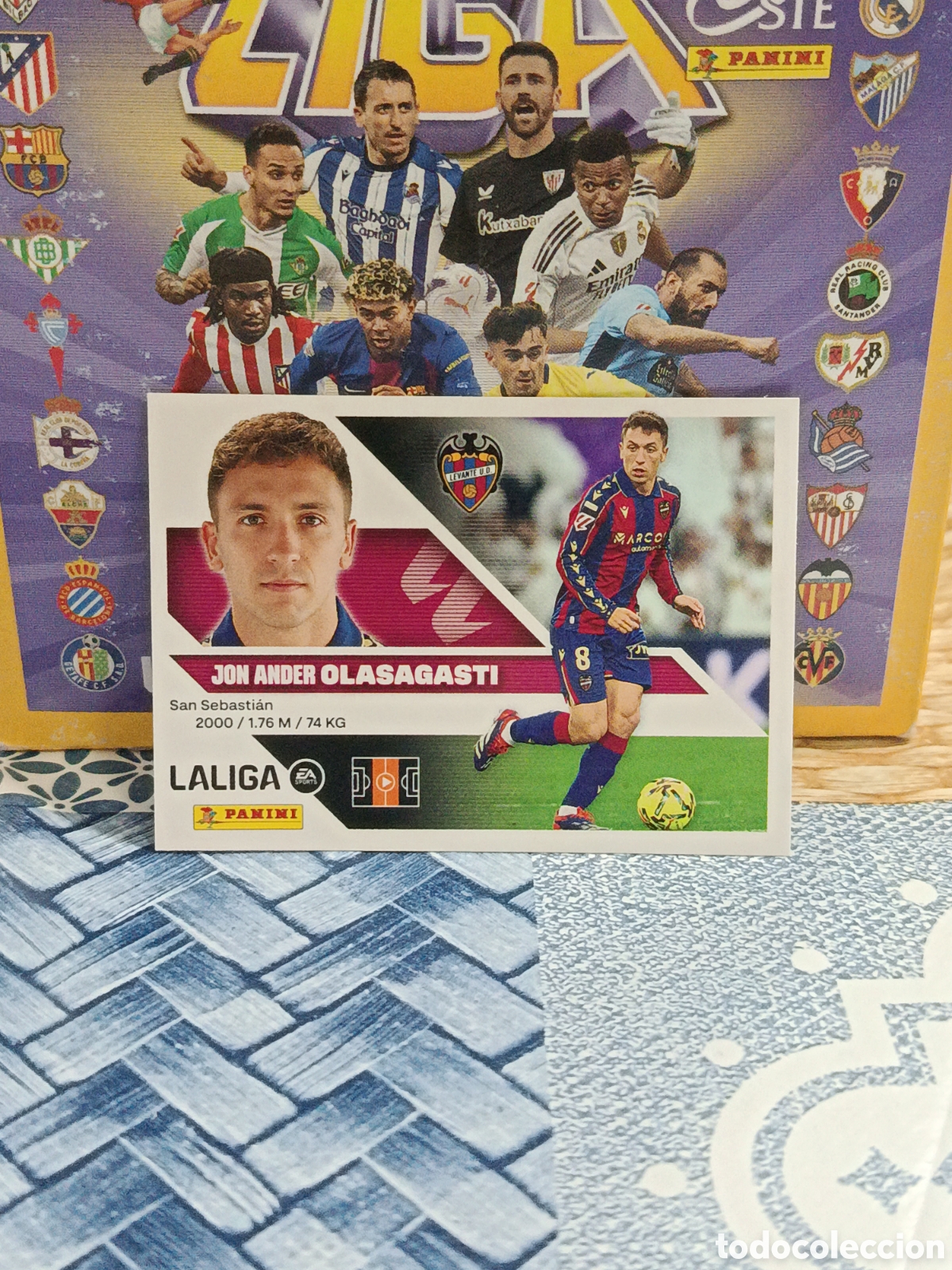 Cromos de Futebol: OLASAGASTI LEVANTE N&ordm; 12 LIGA ESTE 26 27 2026 2027 PANINI &rdquo;NUEVO DE SOBRE&rdquo;