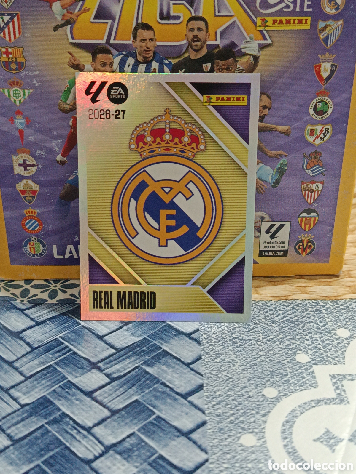 Cromos de Futebol: ESCUDO REAL MADRID N&ordm; 1 LIGA ESTE 26 27 2026 2027 PANINI &rdquo;NUEVO DE SOBRE&rdquo;