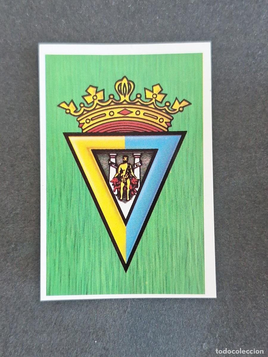 Fu&szlig;ball-Sticker: L5 ESCUDO CADIZ C. F. LIGA ESTE 1988 1989 88 89 NUNCA PEGADO SIN PEGAR