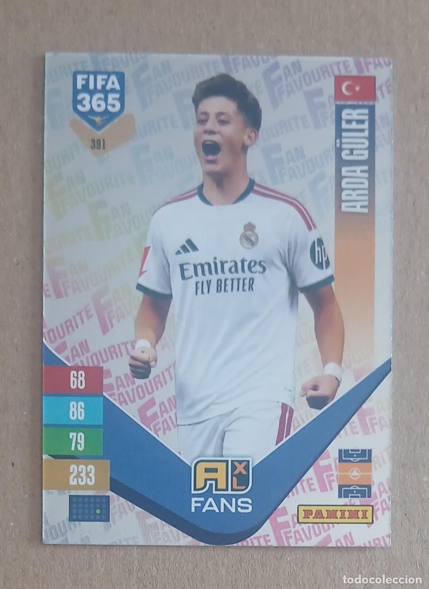 Cromos de f&uacute;tbol: CROMO n&ordm; 391 G&Uuml;LER REAL MADRID FAN FAVOURITE PLATA ADRENALYN XL FIFA 365 2026-2027. Nuevo de sobre.