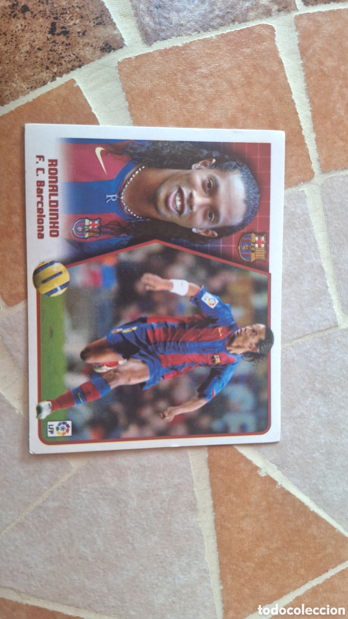 Cromos de f&uacute;tbol: Cromo Ronaldhinho 05 06 con error en el reverso