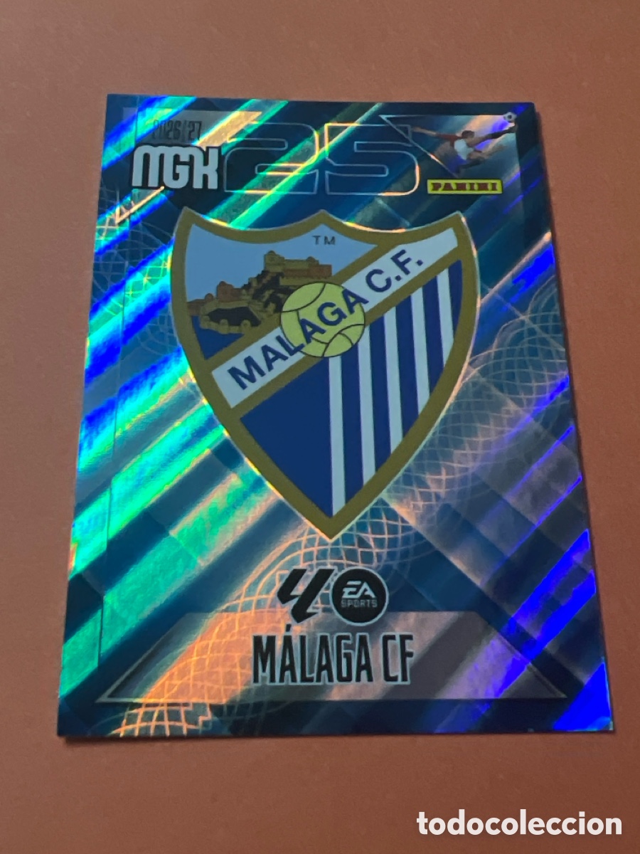Figurine di Calcio: C183. 235 MEGACRACKS MGK 2026 27 ESCUDO M&Aacute;LAGA CF BASE CARD 26 2027 PANINI