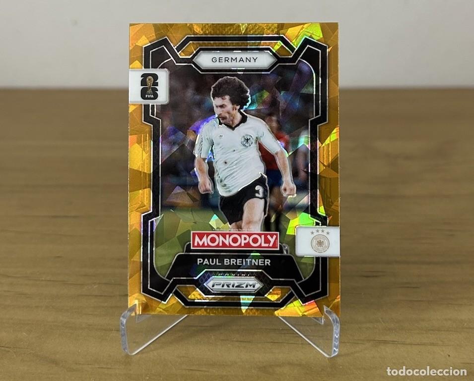 Cartes &agrave; collectionner de Football: Paul Breitner Gold Cracked Ice &ndash; Panini Prizm Monopoly FIFA World Cup 2026